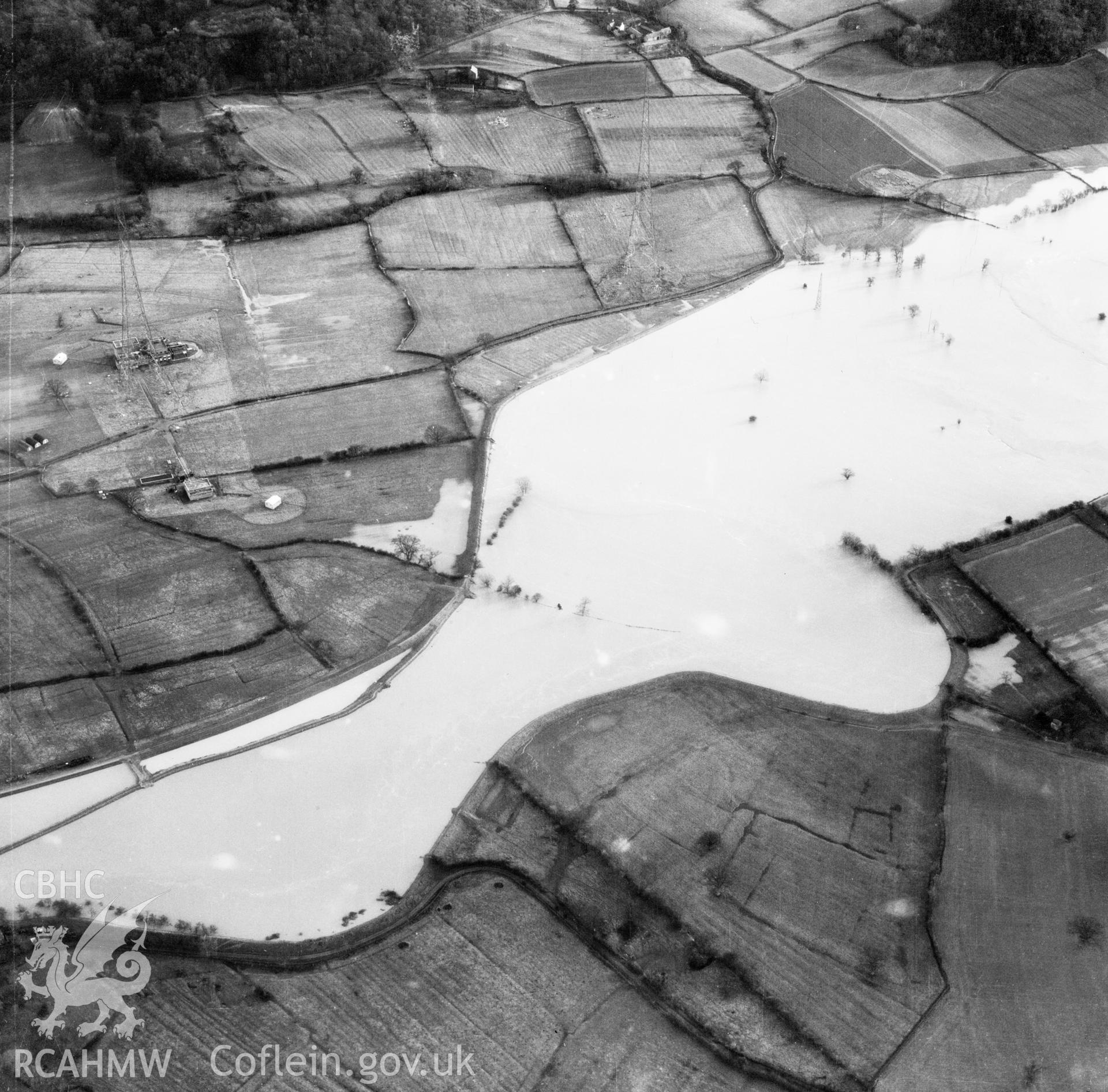 View of the river Severn in flood in the Criggion and Breiddan Hill area. Oblique aerial photograph, 5?" cut roll film.