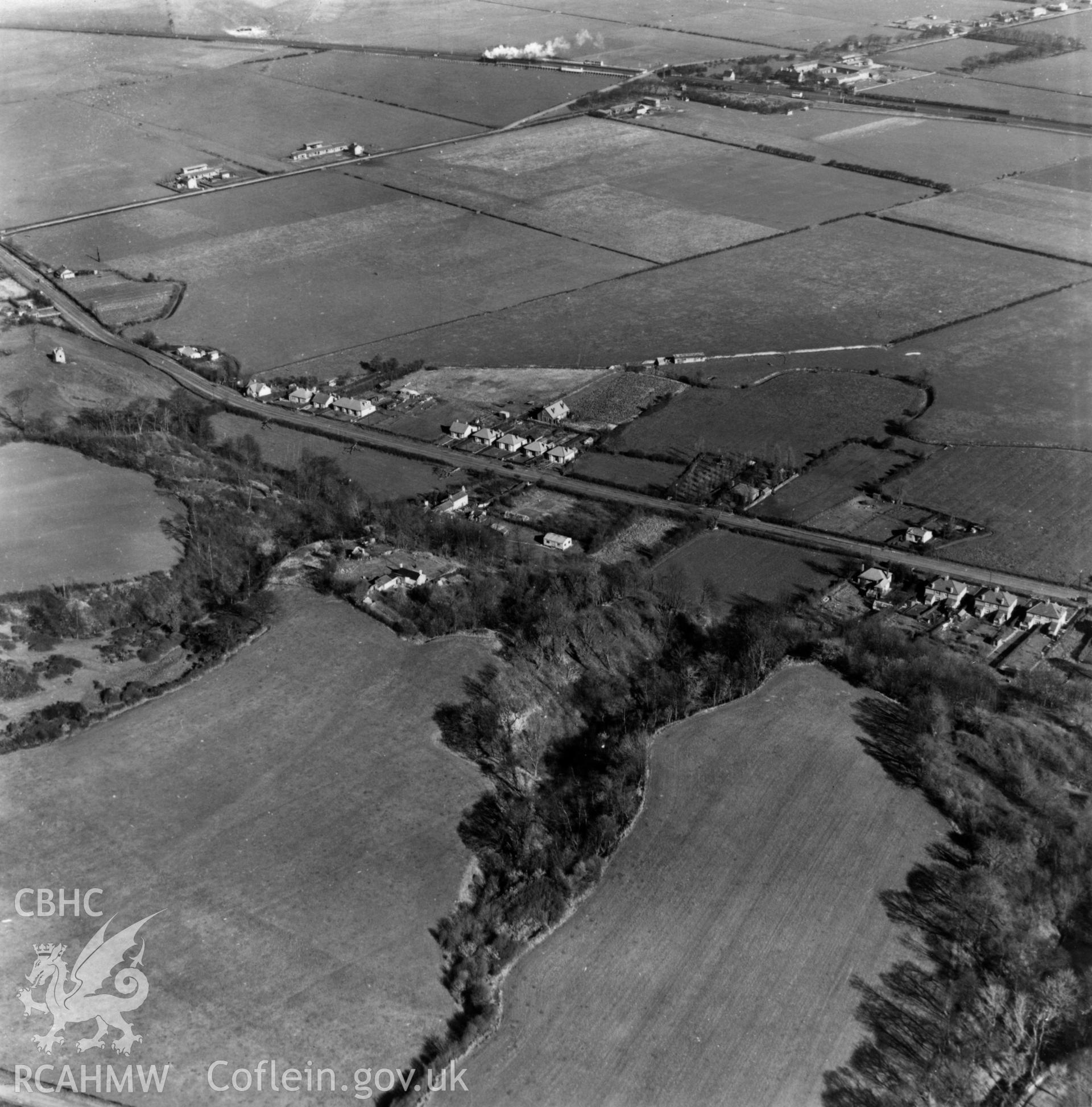 View of Tanlan and the Chester & Holyhead railway. Oblique aerial photograph, 5?" cut roll film.