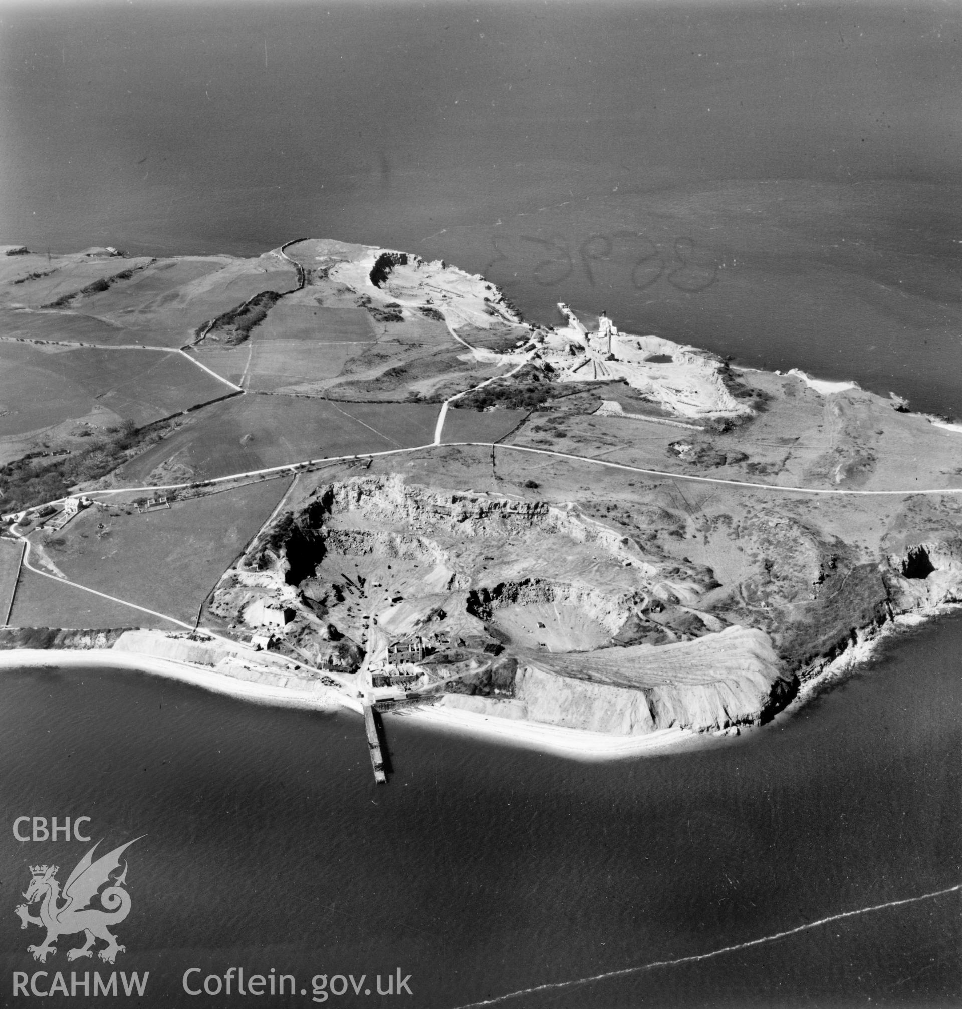 View of Flagstaff and Dinmor Quarries, Anglesey, commissioned by Cawood Wharton & Co. Ltd.. Oblique aerial photograph, 5?" cut roll film.
