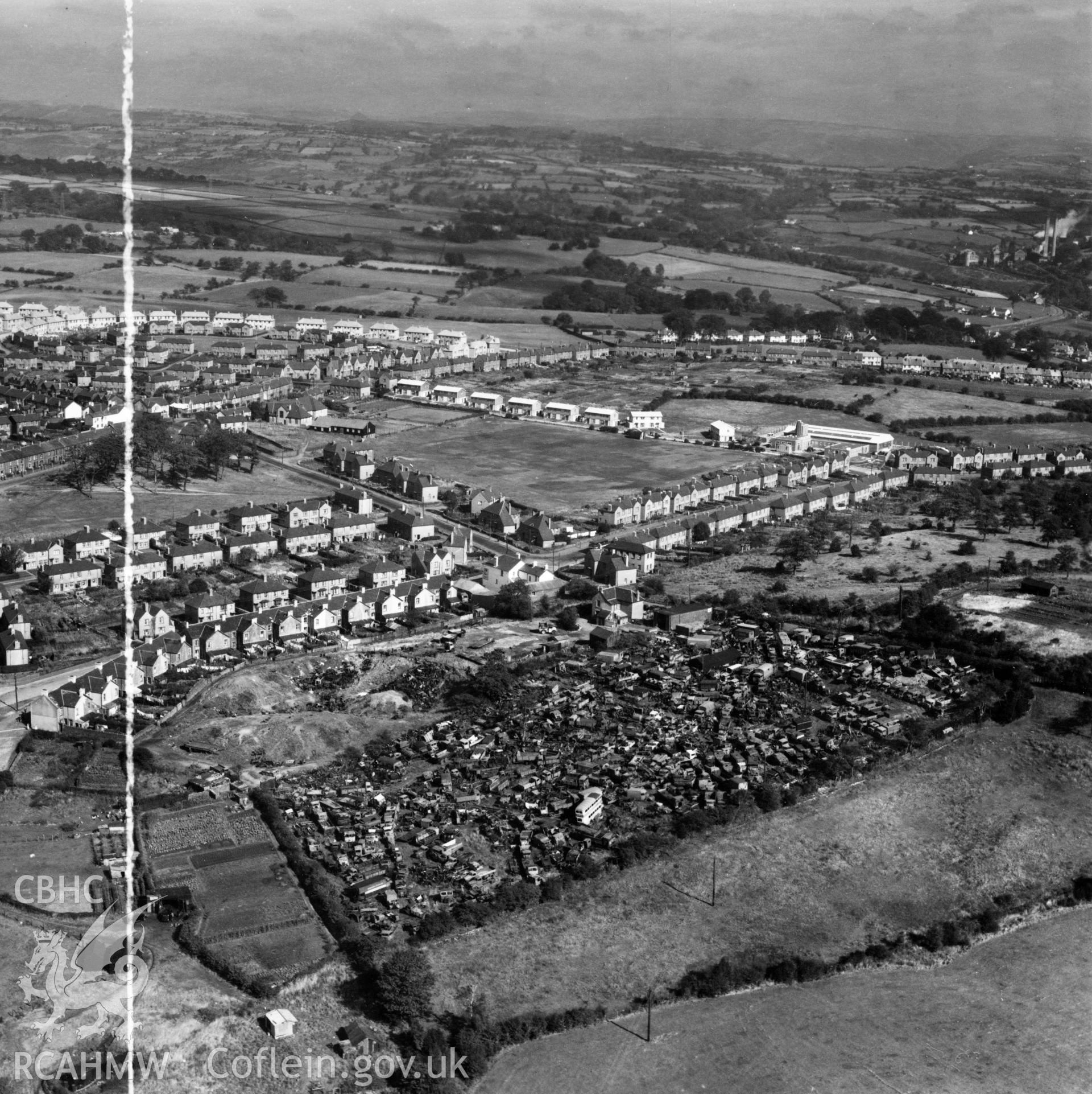 View of Gibbs Brothers vehicle scrap yard at Blackwood, Mynyddislwyn. Oblique aerial photograph, 5?" cut roll film.