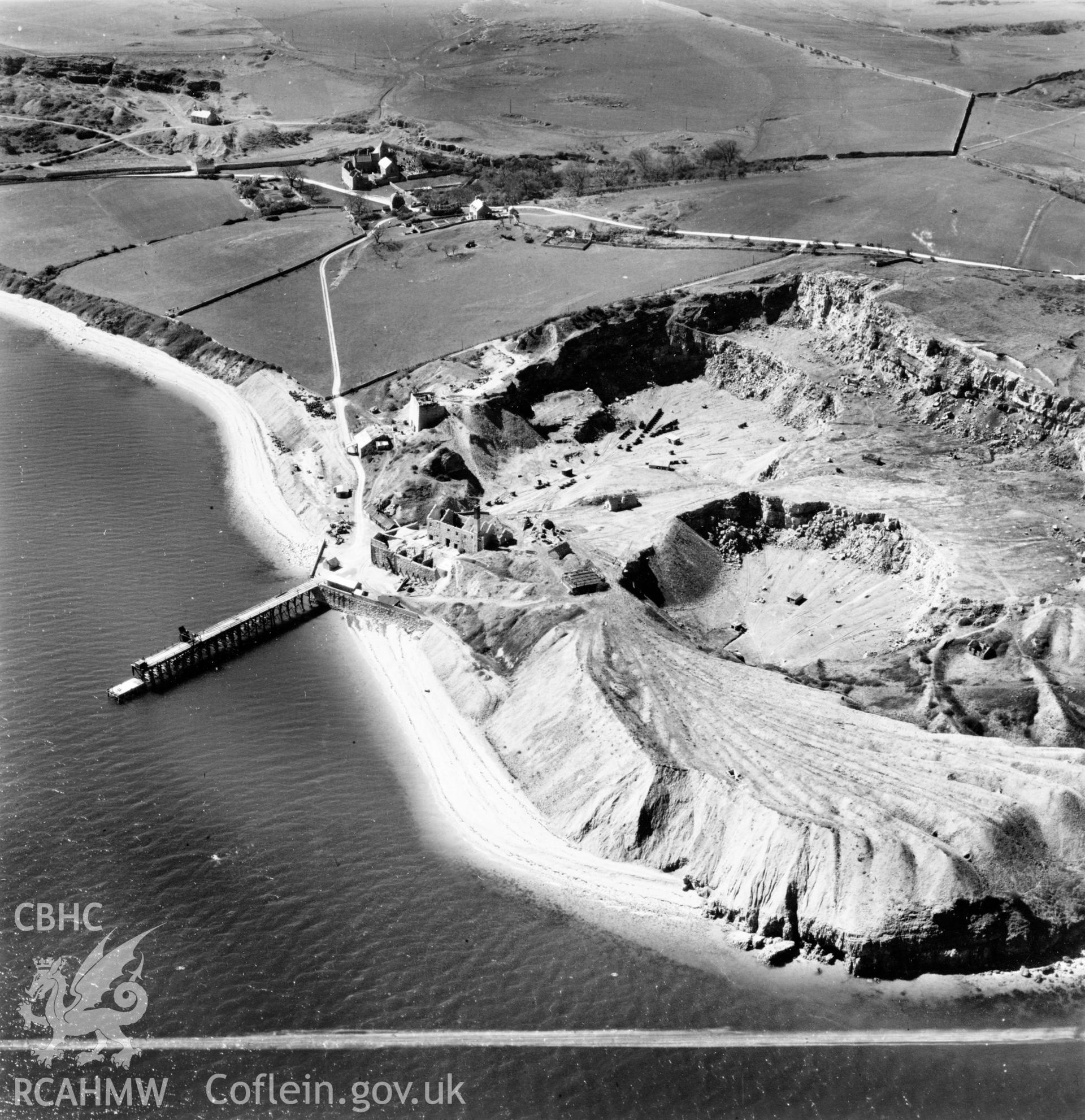 View of Flagstaff Quarry, Anglesey, commissioned by Cawood Wharton & Co. Ltd.. Oblique aerial photograph, 5?" cut roll film.