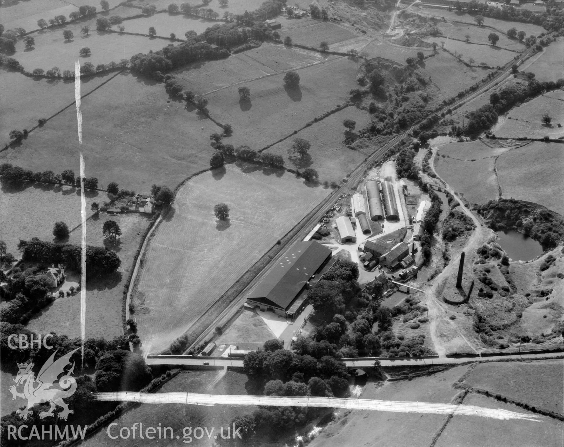 View of factory complex at Peblig Mill, Caernarfon, showing the mill, remains of brickworks, nissan huts and other works buildings