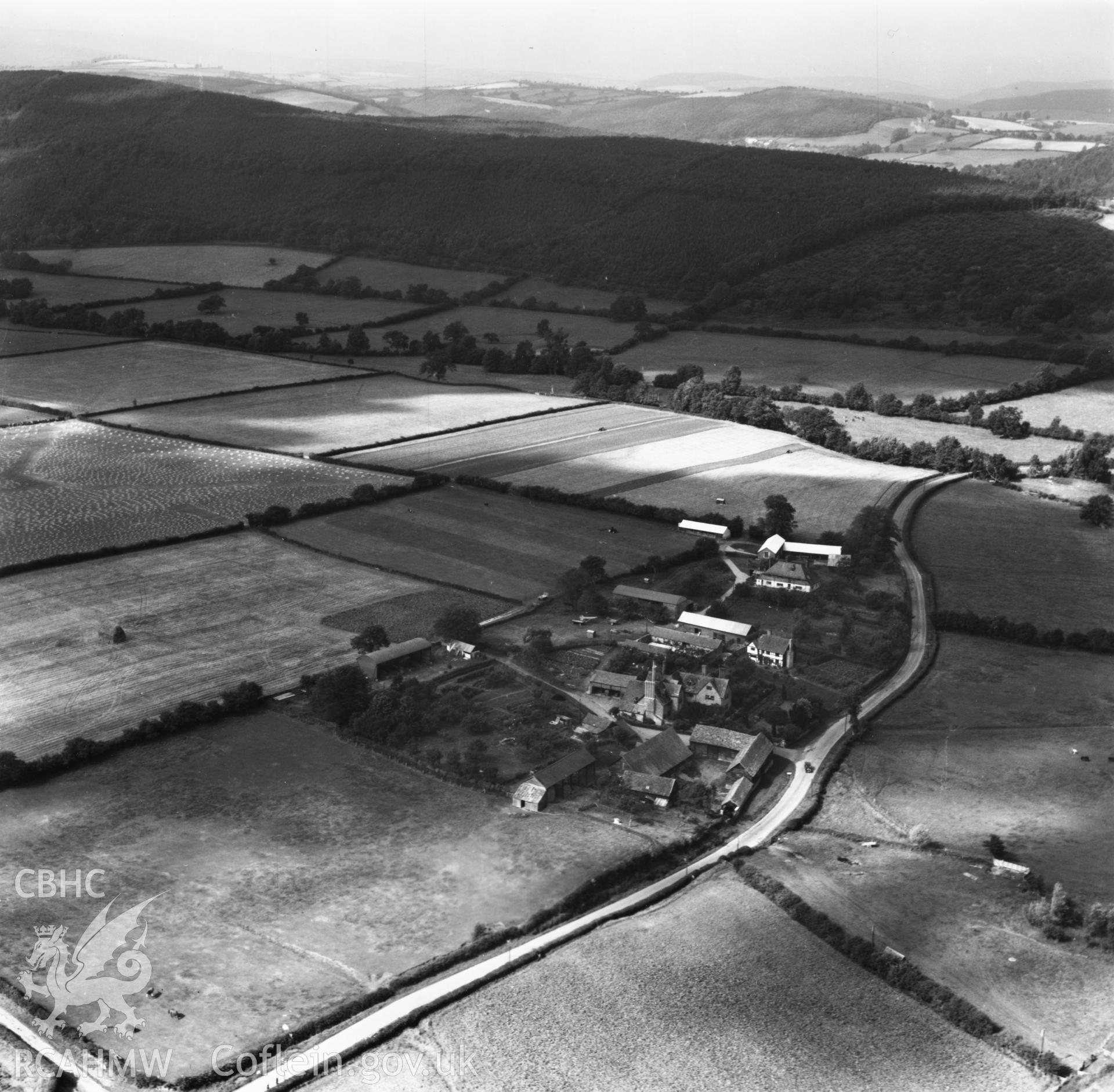 View of Rodd House, Presteigne in surrounding landscape. Oblique aerial photograph, 5?" cut roll film.