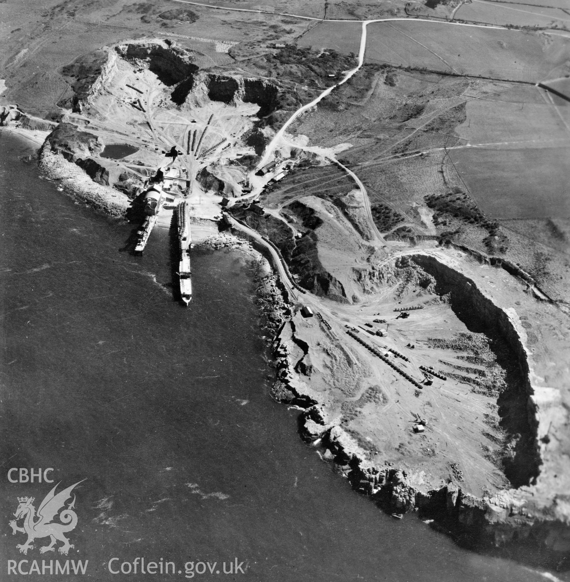 View of Dinmor Park Quarry, Anglesey, commissioned by Cawood Wharton & Co. Ltd.. Oblique aerial photograph, 5?" cut roll film.