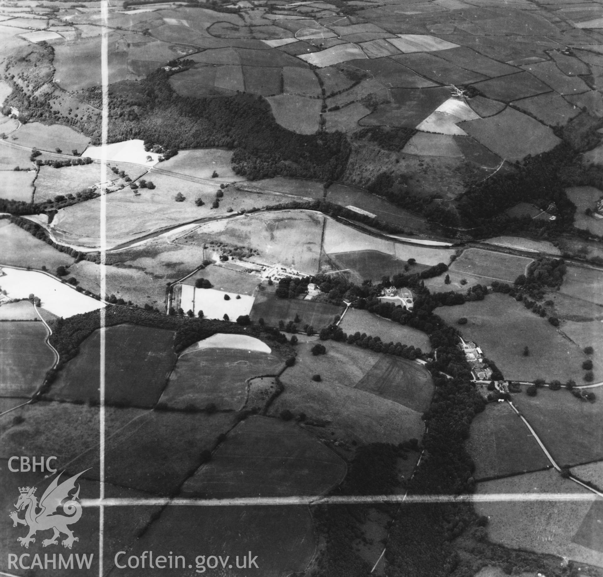 Distant view of Abermad and Henblas in surrounding landscape, listed as 'Holywood School'. Oblique aerial photograph, 5?" cut roll film.