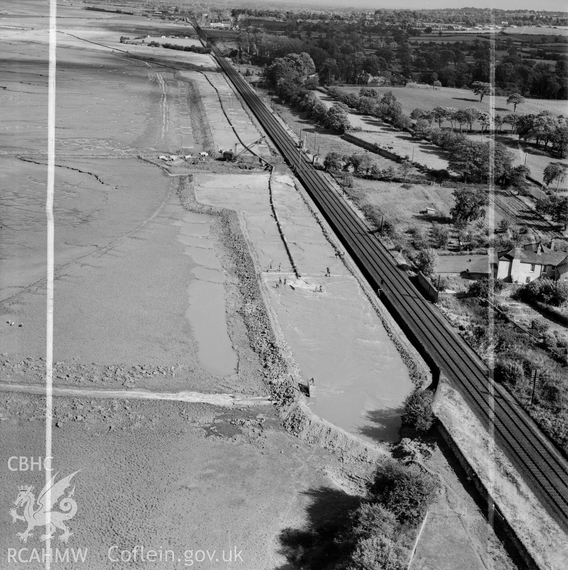 View of dredging work (shows men at work), for Shotton Steelworks commissioned by the Westminster Dredging Co. Ltd