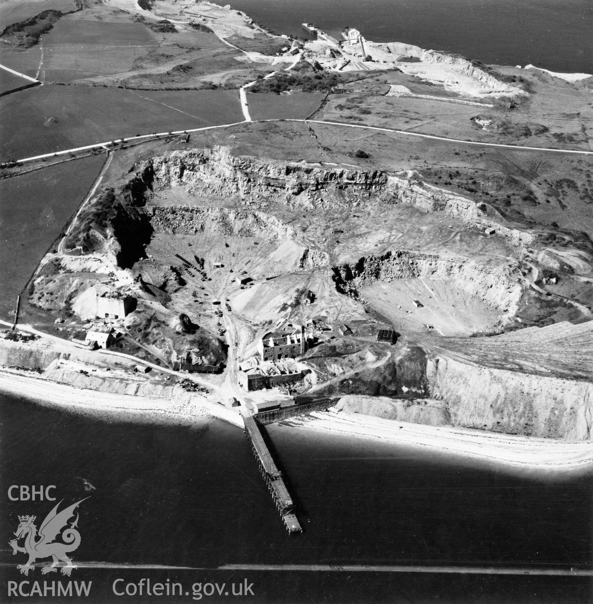 View of Flagstaff Quarry, Anglesey, commissioned by Cawood Wharton & Co. Ltd.. Oblique aerial photograph, 5?" cut roll film.
