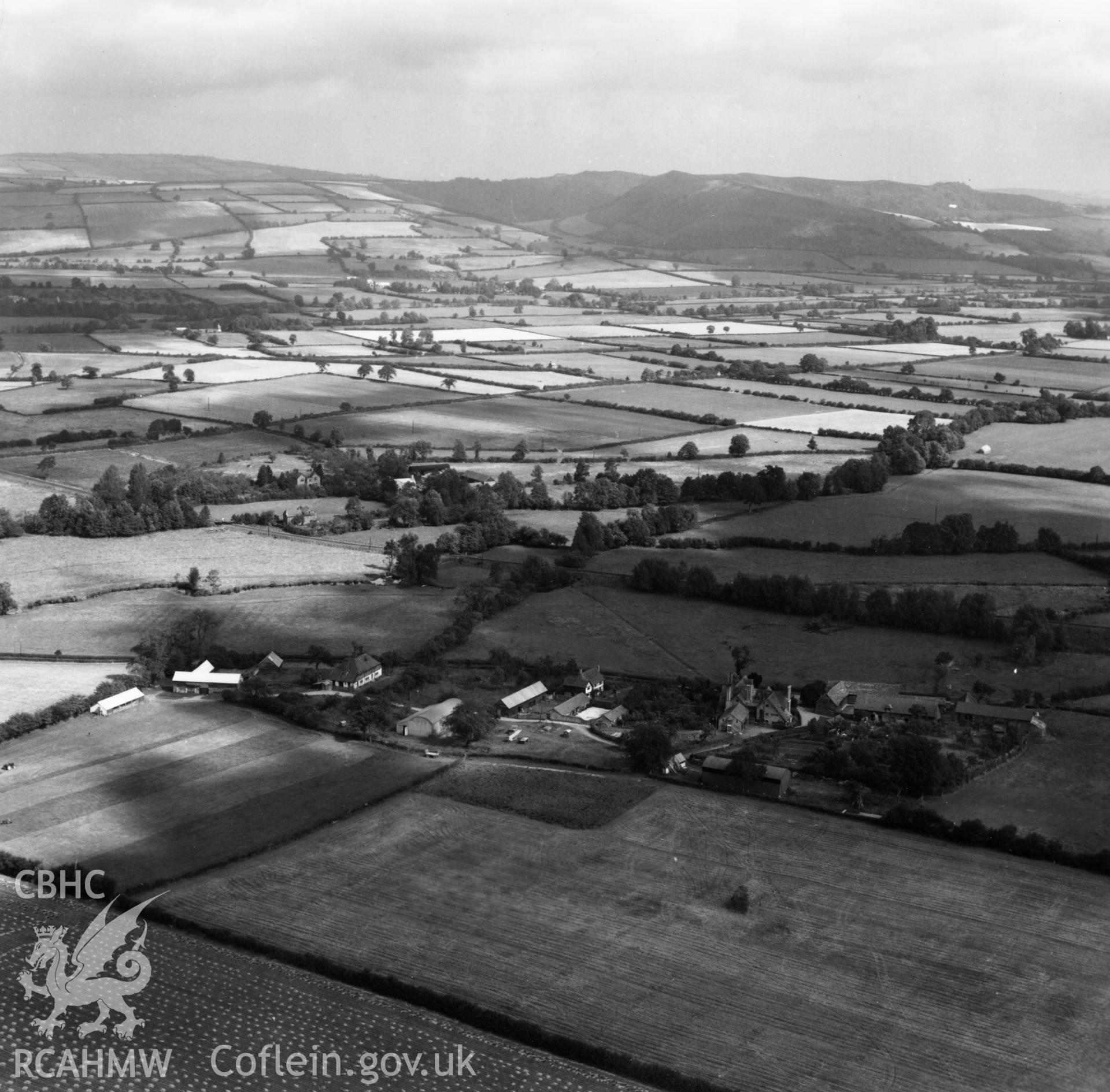 View of Rodd House, Presteigne in surrounding landscape. Oblique aerial photograph, 5?" cut roll film.