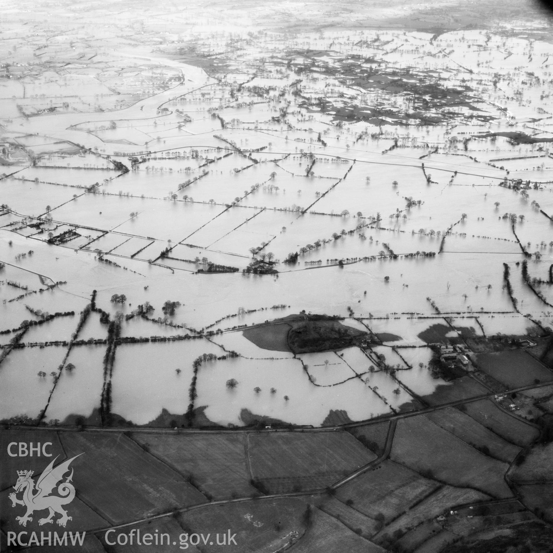 View of the river Severn in flood in the Criggion and Breiddan Hill area. Oblique aerial photograph, 5?" cut roll film.