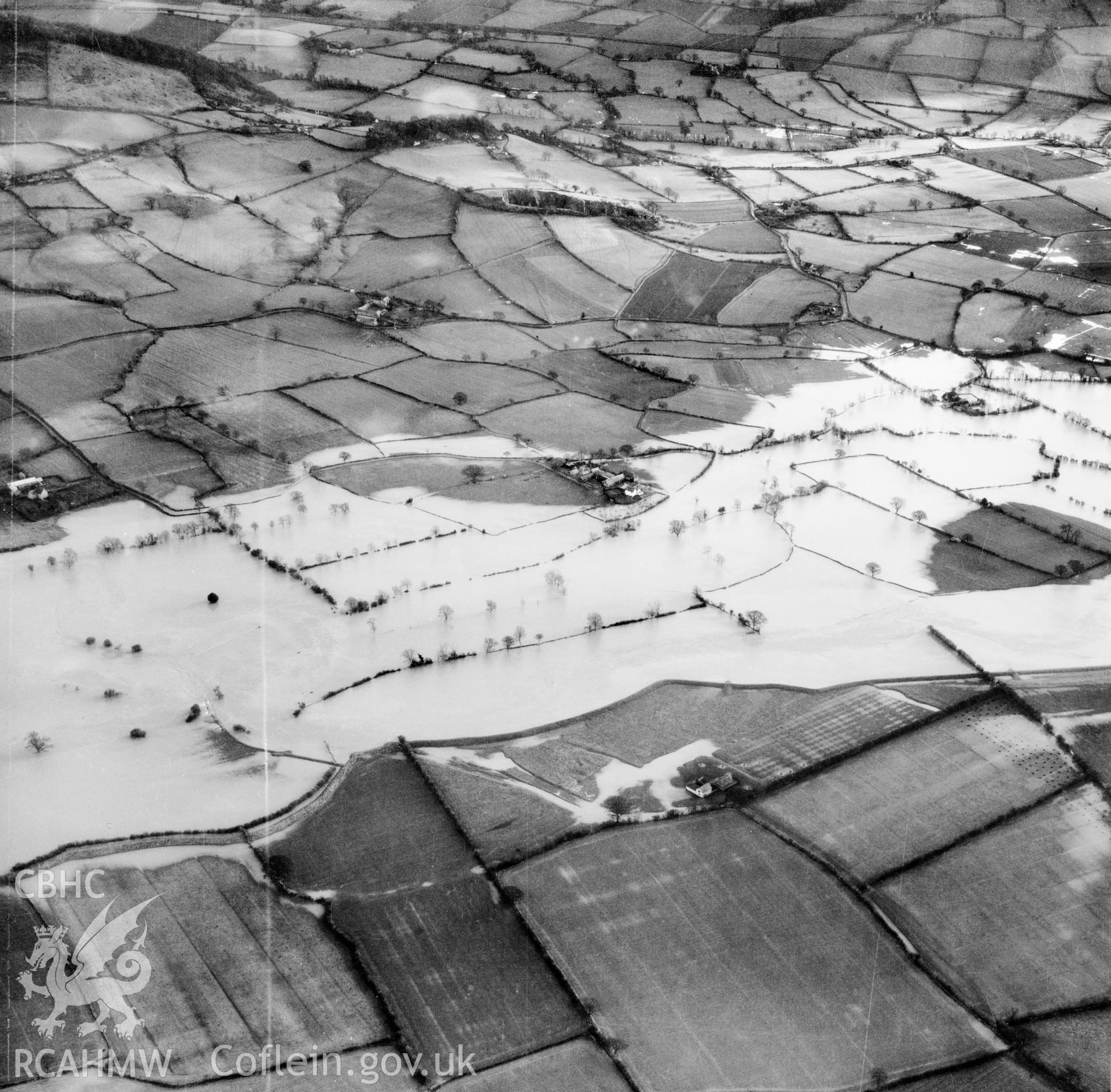 View of the river Severn in flood in the Criggion and Breiddan Hill area. Oblique aerial photograph, 5?" cut roll film.