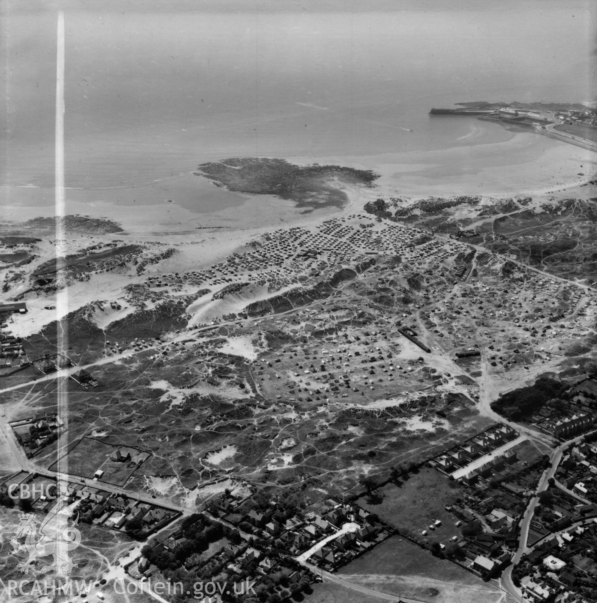 View of Newton Burrows, Porthcawl showing caravans. Oblique aerial photograph, 5?" cut roll film.