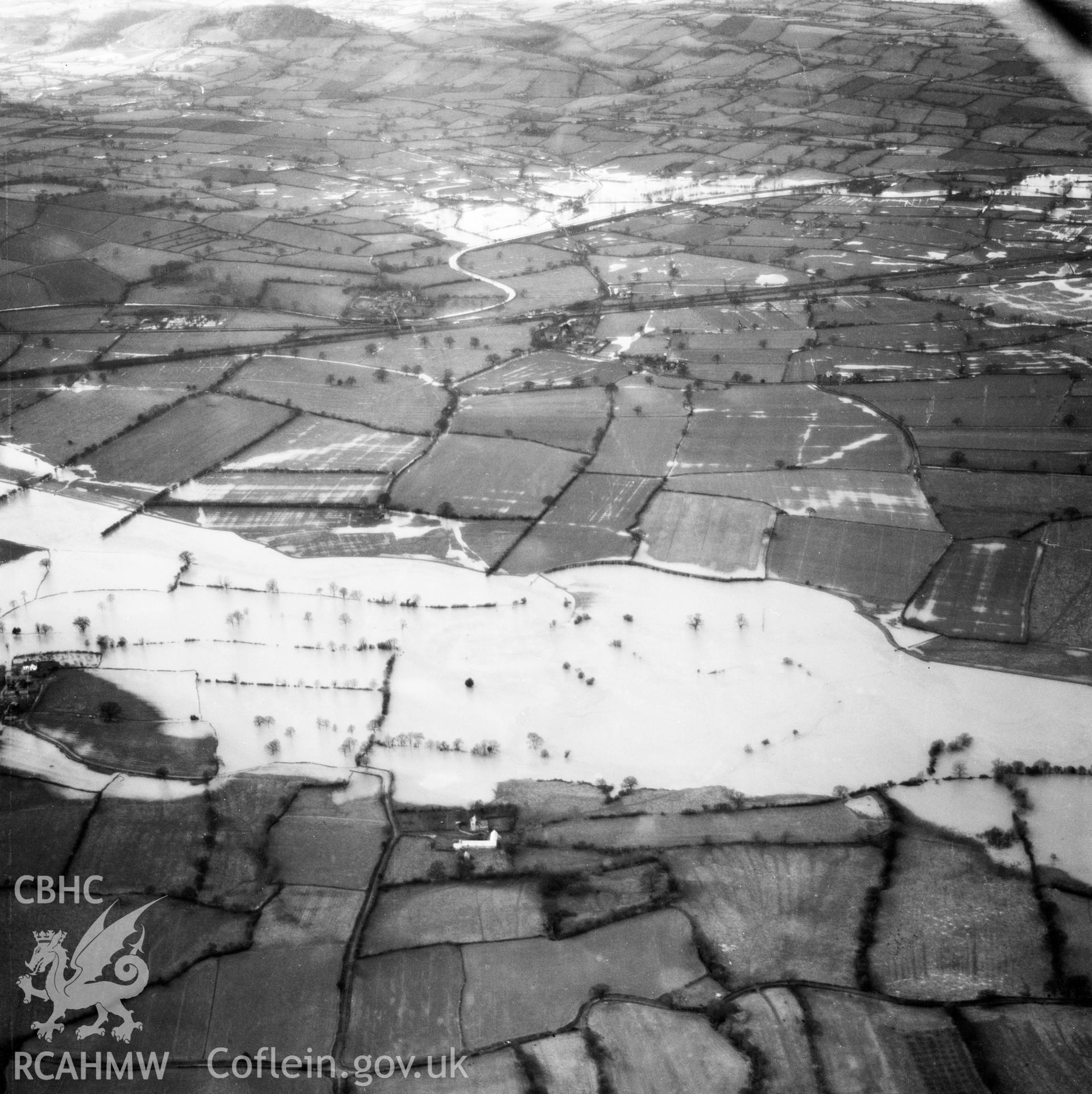 View of the river Severn in flood in the Criggion and Breiddan Hill area. Oblique aerial photograph, 5?" cut roll film.