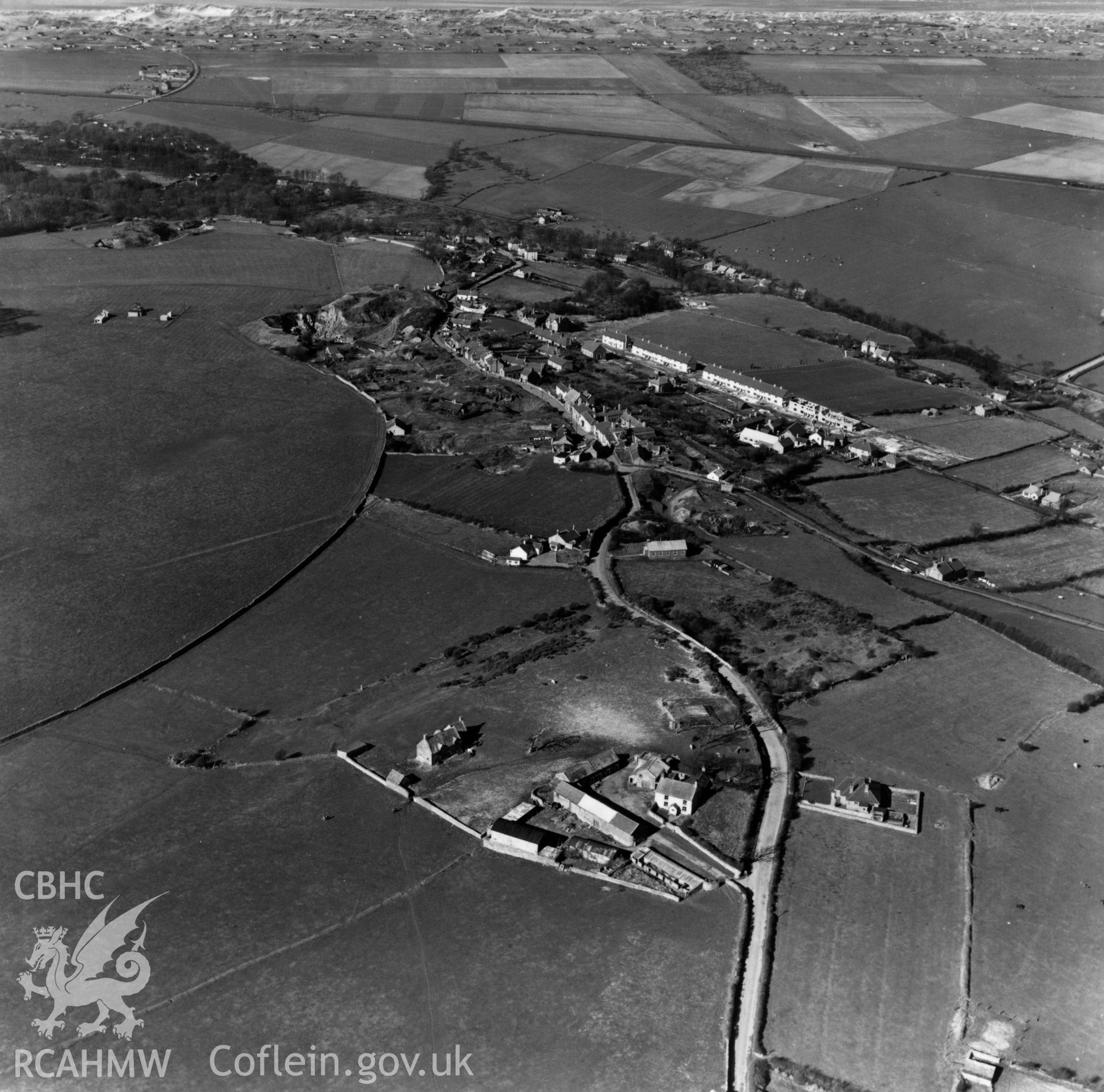View of Gwespyr showing Bryn Llystyn and Talacre quarries. Oblique aerial photograph, 5?" cut roll film.