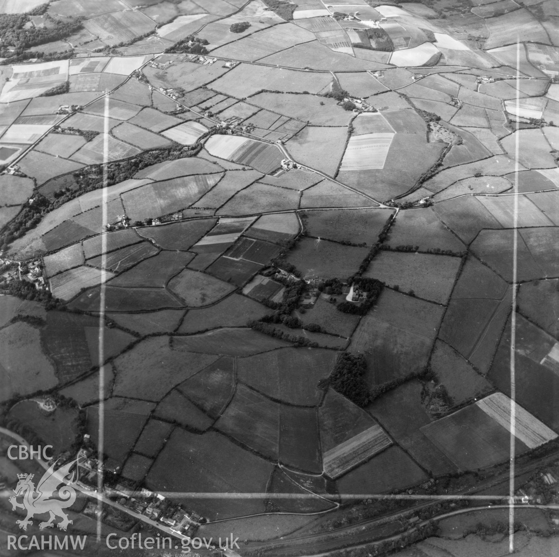 View of landscape above Llanbadarn village showing site of Agricultural college and Plas Lluest, commissioned by J.E. Nichols. Oblique aerial photograph, 5?" cut roll film.