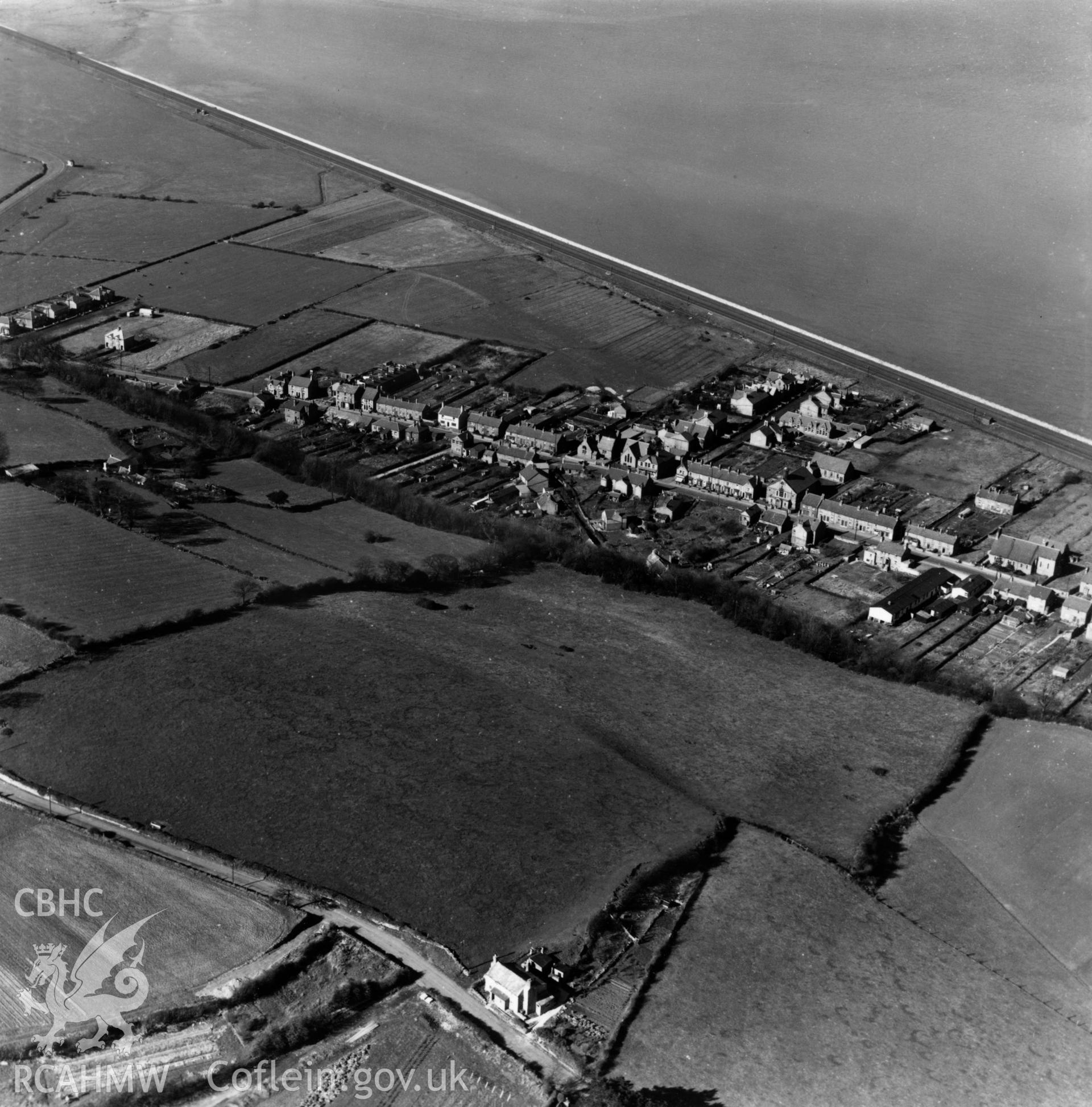 View of Ffynnongroyw with Pen-y-bryn in the foreground. Oblique aerial photograph, 5?" cut roll film.