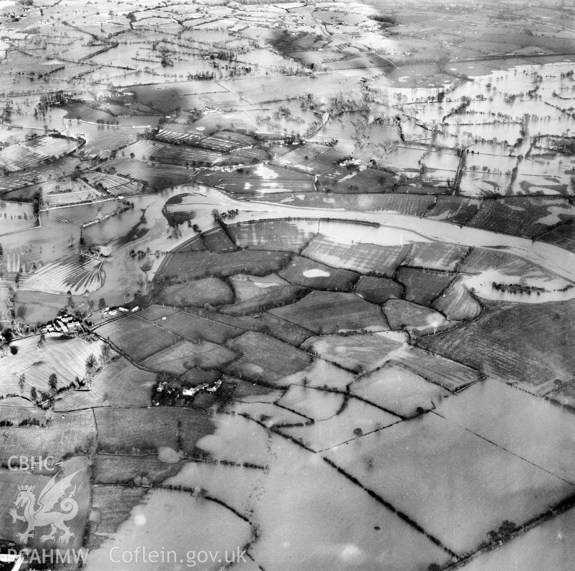 View of the river Severn in flood in the Criggion and Breiddan Hill area. Oblique aerial photograph, 5?" cut roll film.