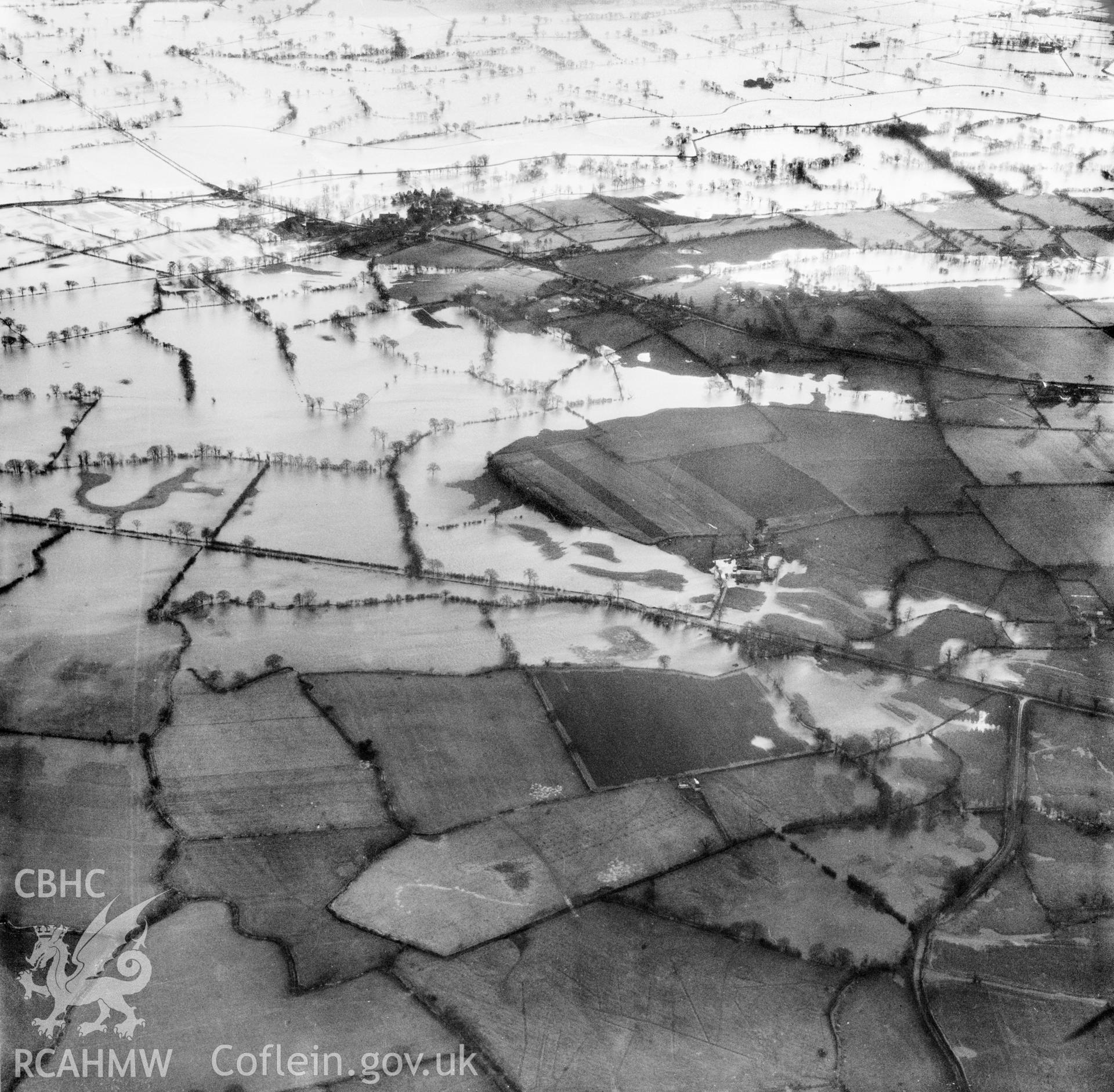 View of the river Severn in flood in the Criggion and Breiddan Hill area. Oblique aerial photograph, 5?" cut roll film.