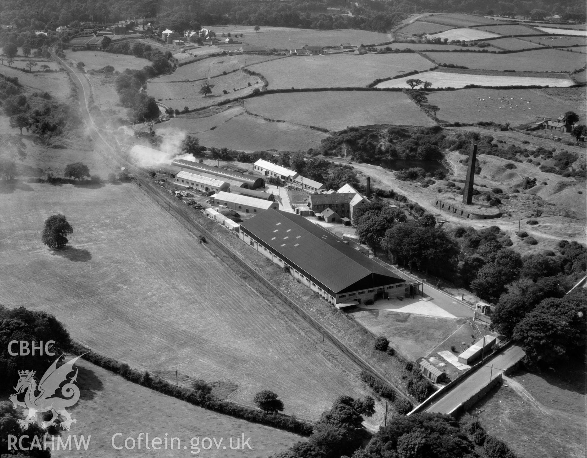 View of factory complex at Peblig Mill, Caernarfon, showing the mill, remains of brickworks, nissan huts and other works buildings