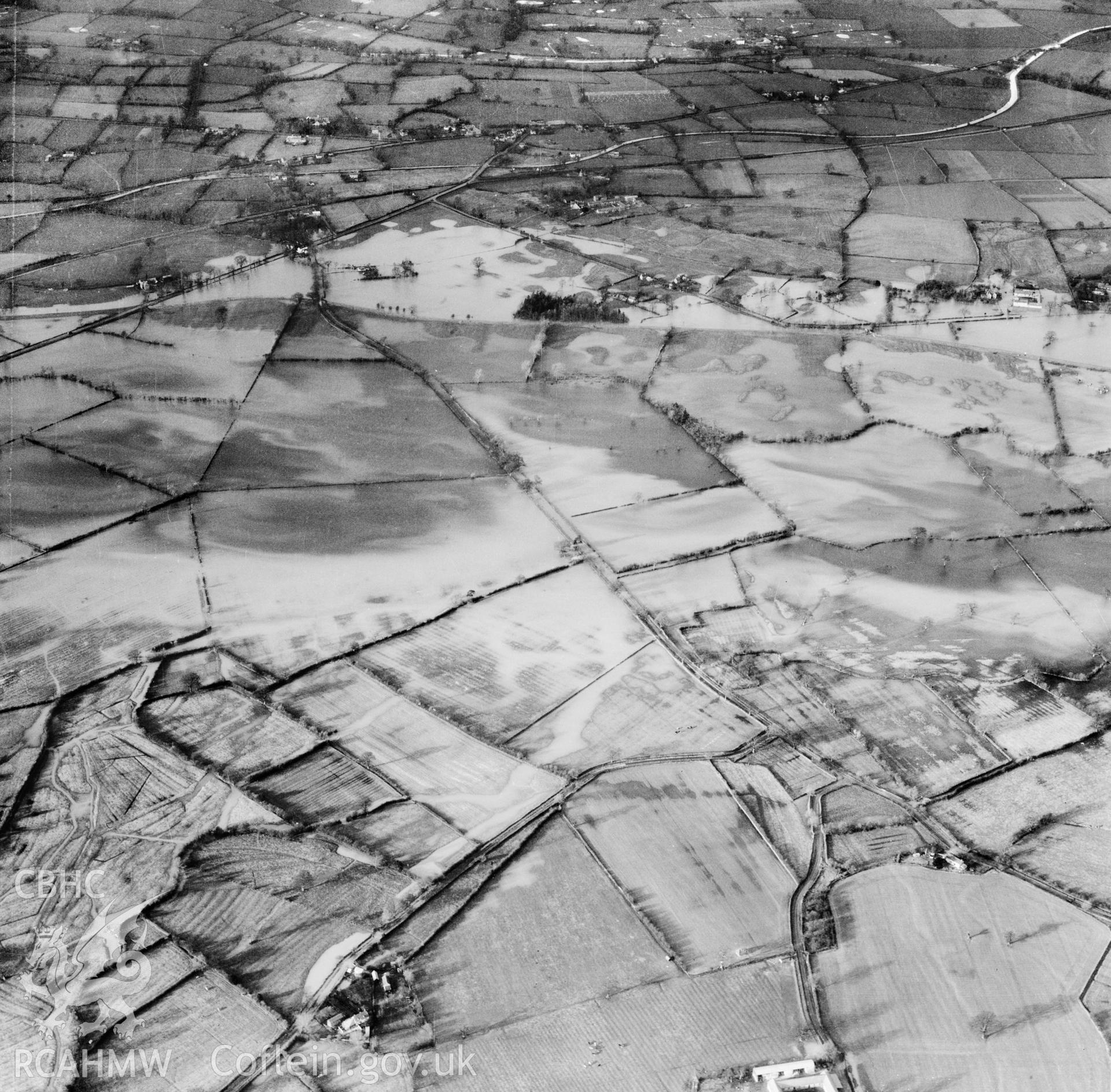 View of the river Severn in flood in the Criggion and Breiddan Hill area. Oblique aerial photograph, 5?" cut roll film.