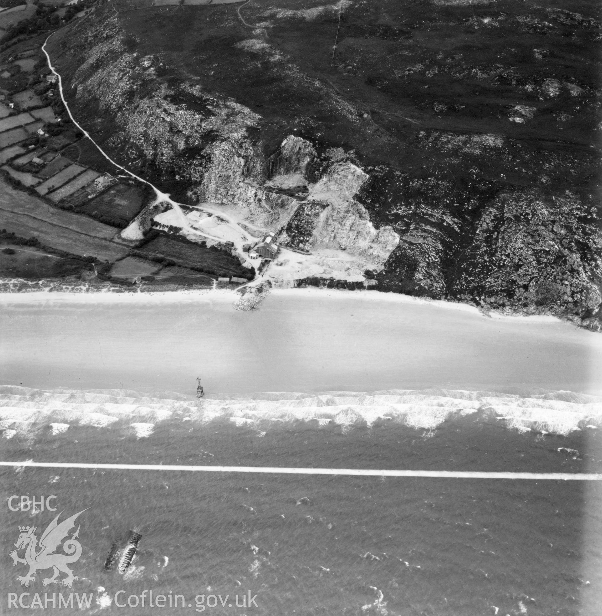 View of Llanbedrog quarry, showing aerial ropeway, commissioned by Cawood Wharton & Co. Ltd.. Oblique aerial photograph, 5?" cut roll film.