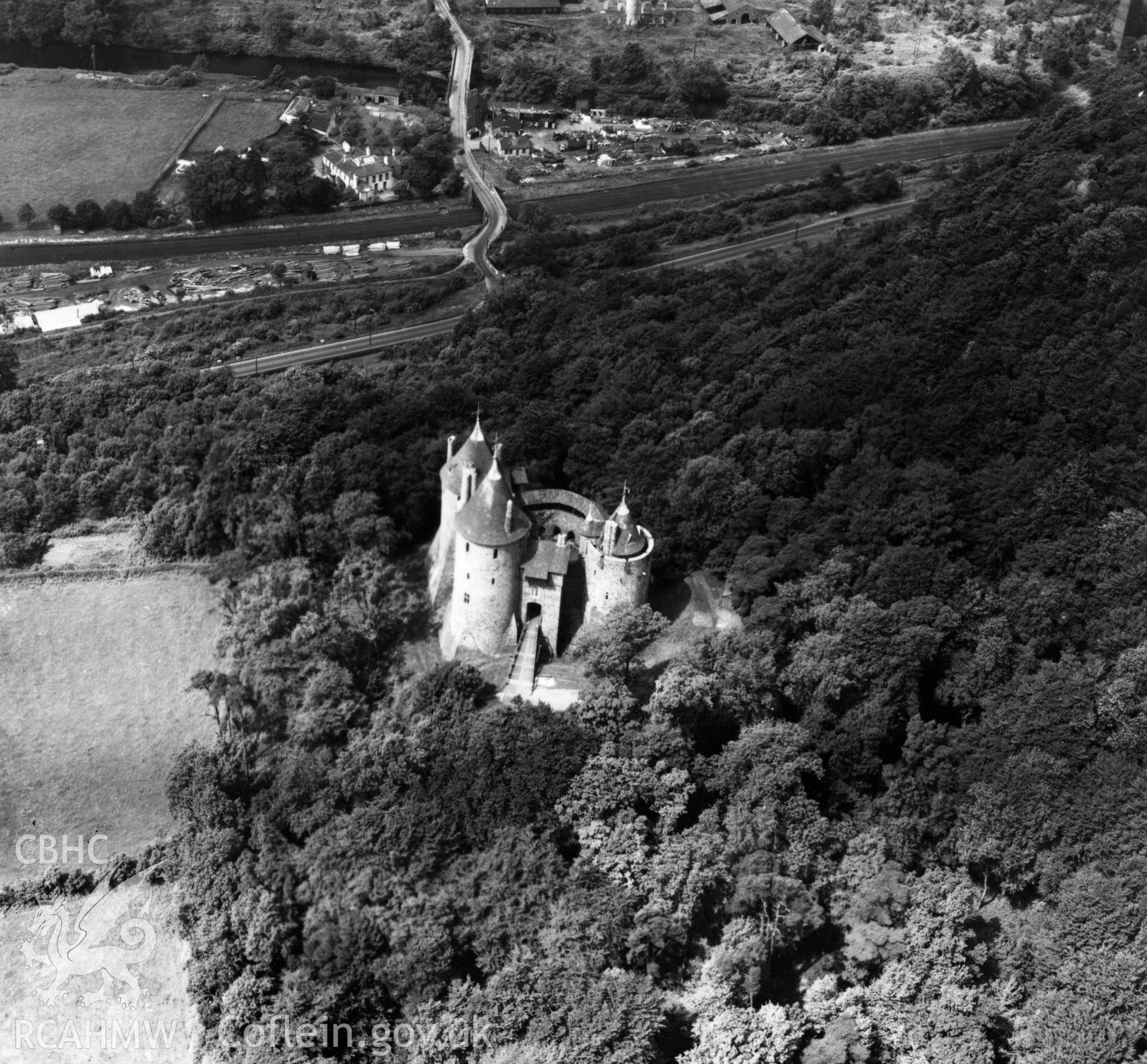 View of Castell Coch, Tongwynlais, showing Ynys House and road bridge. Oblique aerial photograph, 5?" cut roll film.