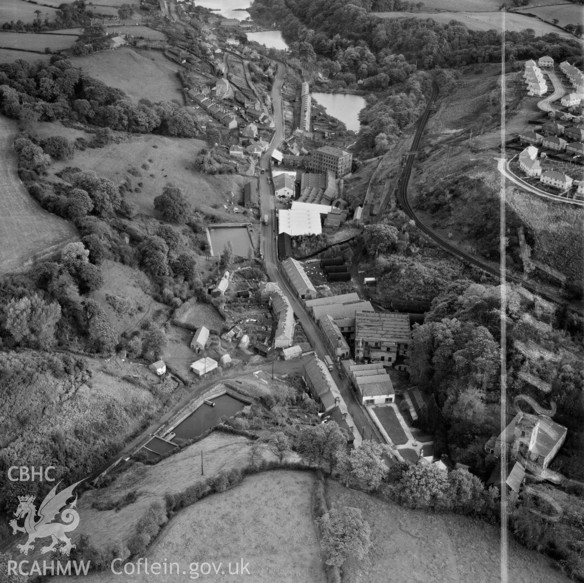 View of Holywell, commissioned by Holywell Textile Mills Ltd., showing industrial buildings and housing estate