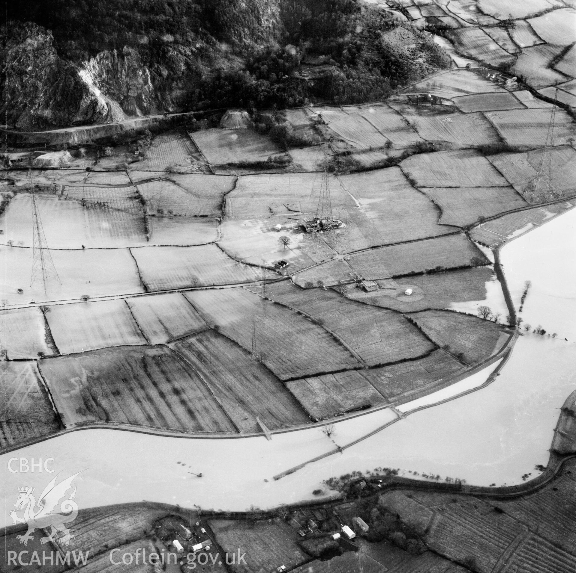 View of the river Severn in flood in the Criggion and Breiddan Hill area. Oblique aerial photograph, 5?" cut roll film.