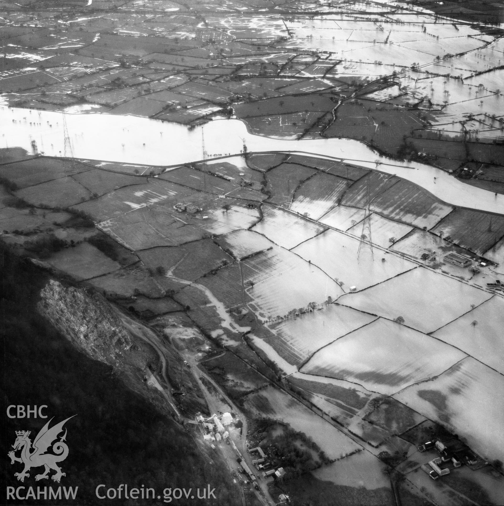 View of the river Severn in flood in the Criggion and Breiddan Hill area. Oblique aerial photograph, 5?" cut roll film.