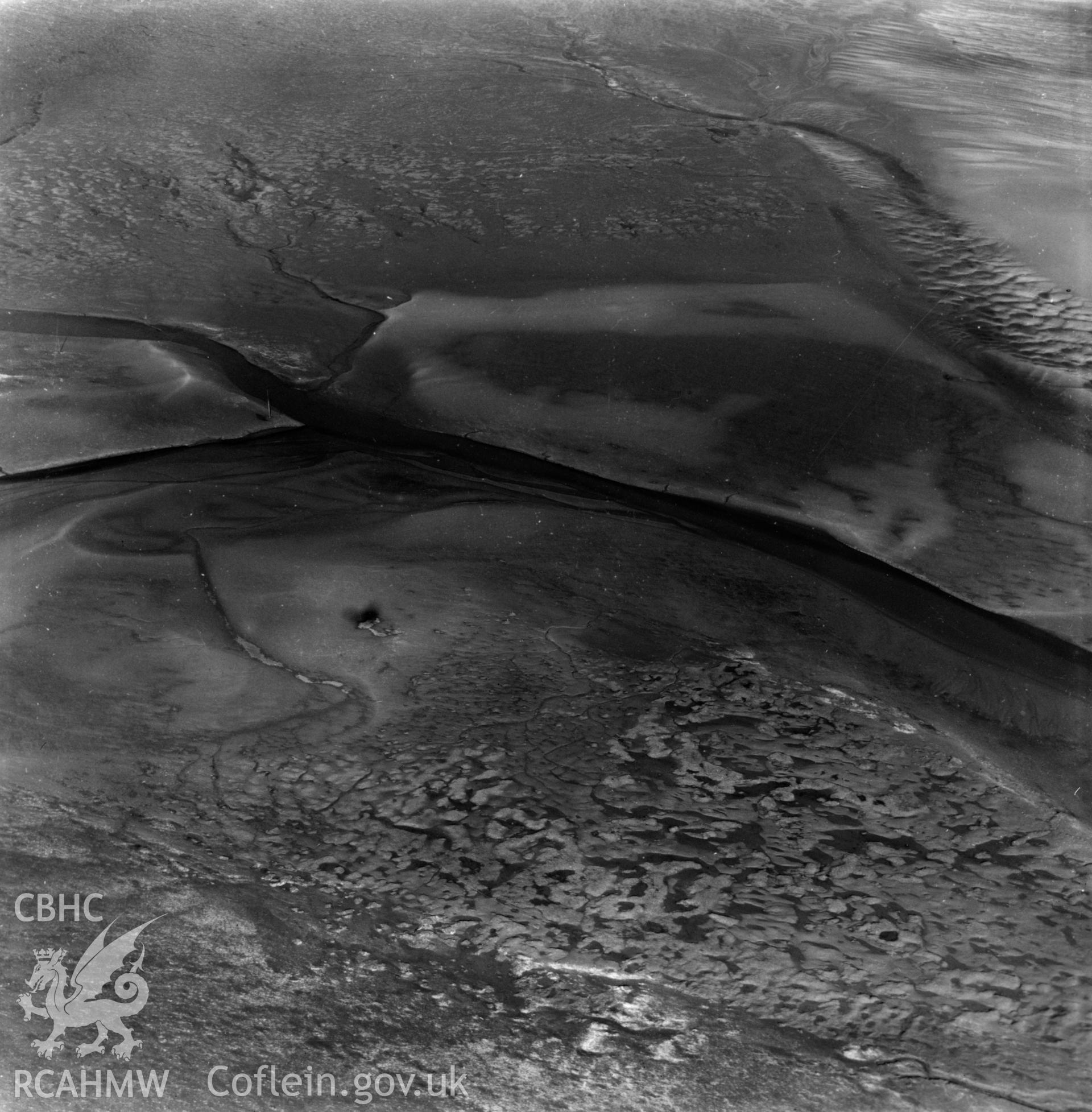 View of mudflats at Point of Ayr. Oblique aerial photograph, 5?" cut roll film.