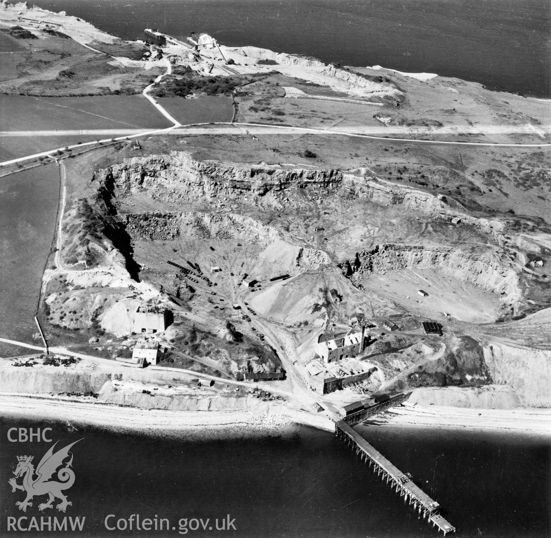 View of Flagstaff Quarry, Anglesey, commissioned by Cawood Wharton & Co. Ltd.. Oblique aerial photograph, 5?" cut roll film.