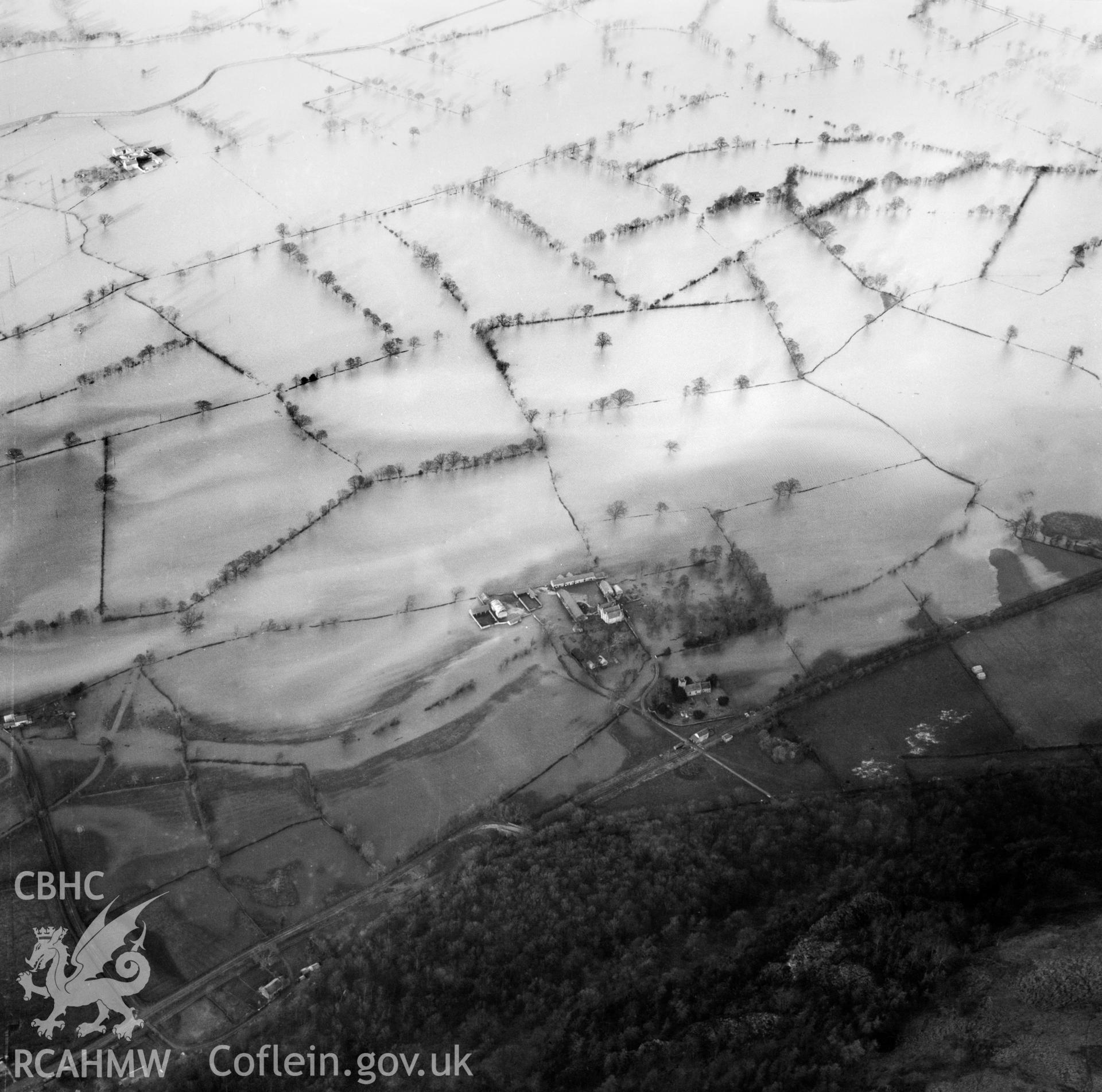 View of the river Severn in flood in the Criggion and Breiddan Hill area. Oblique aerial photograph, 5?" cut roll film.