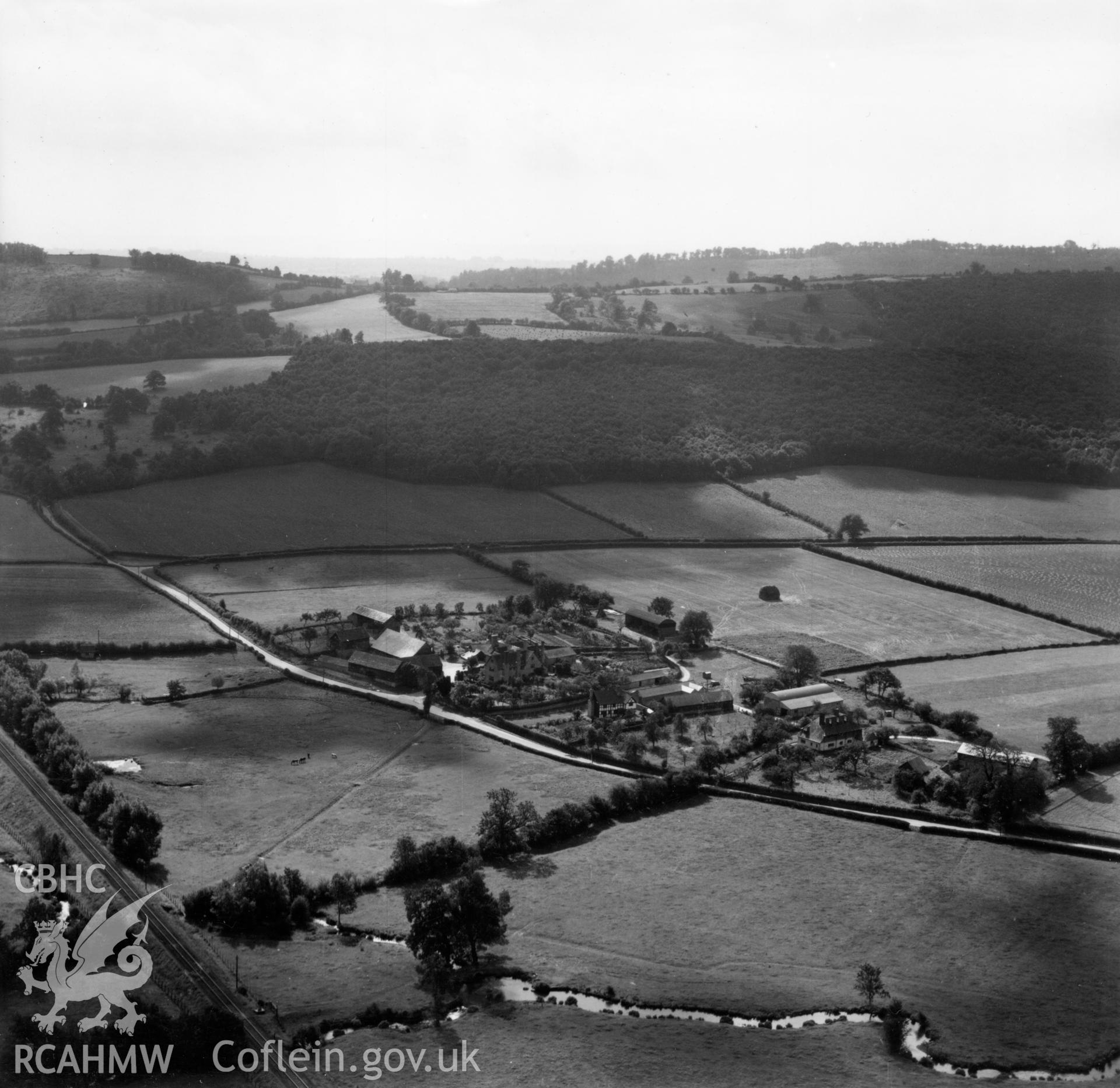 View of Rodd House, Presteigne in surrounding landscape. Oblique aerial photograph, 5?" cut roll film.