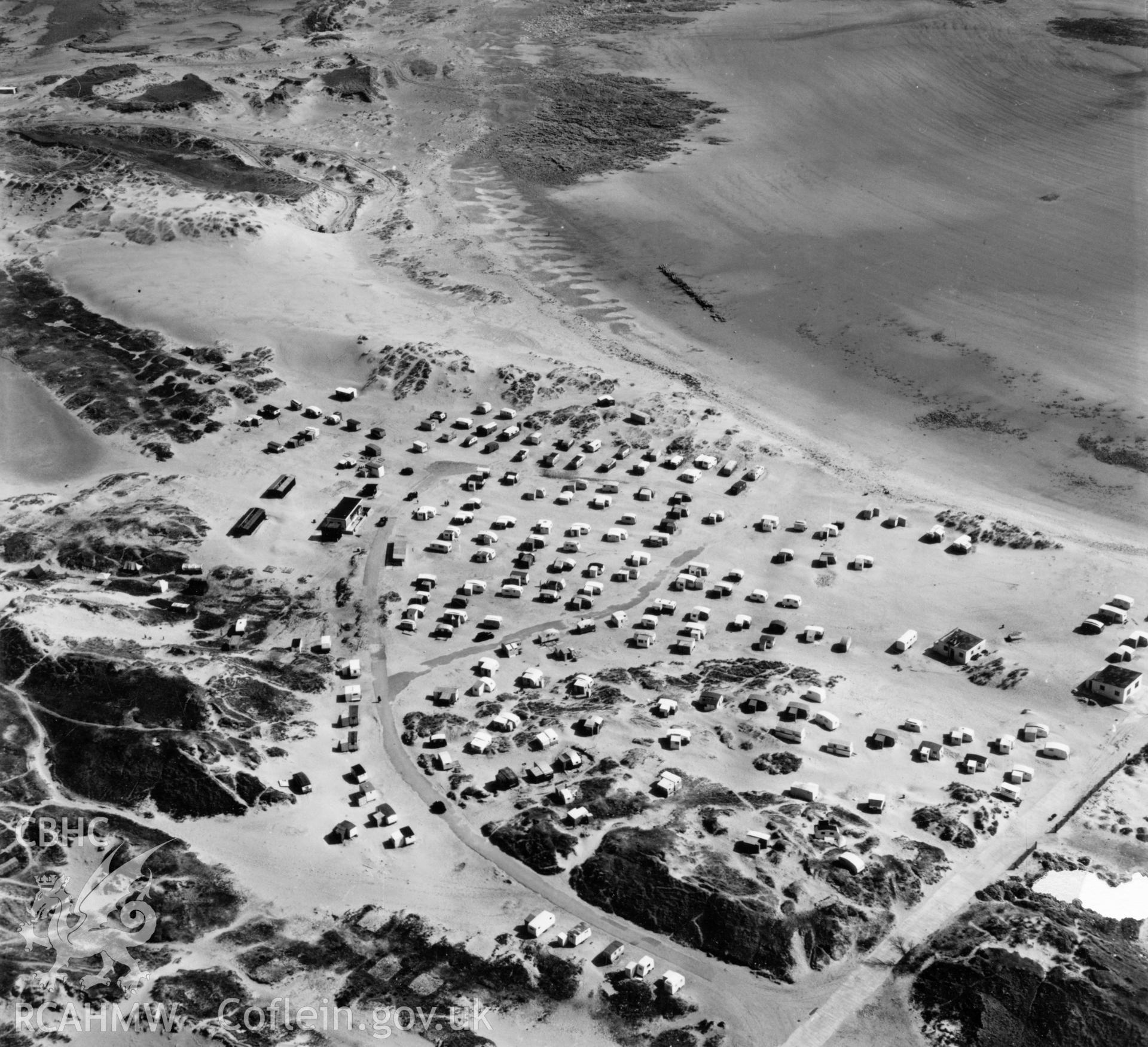 View of caravans on the beach at Porthcawl. Oblique aerial photograph, 5?" cut roll film.