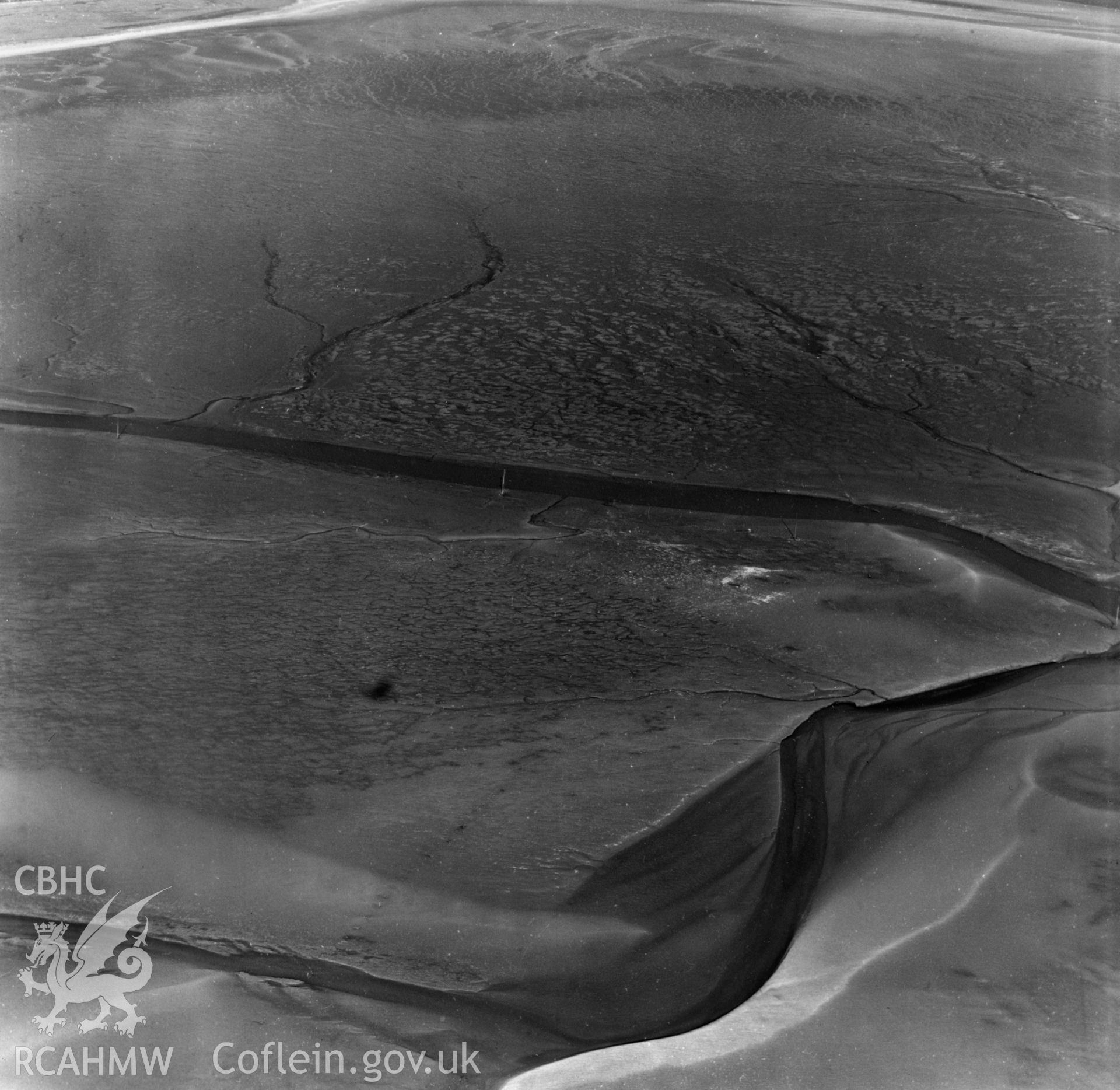 View of mudflats at Point of Ayr. Oblique aerial photograph, 5?" cut roll film.