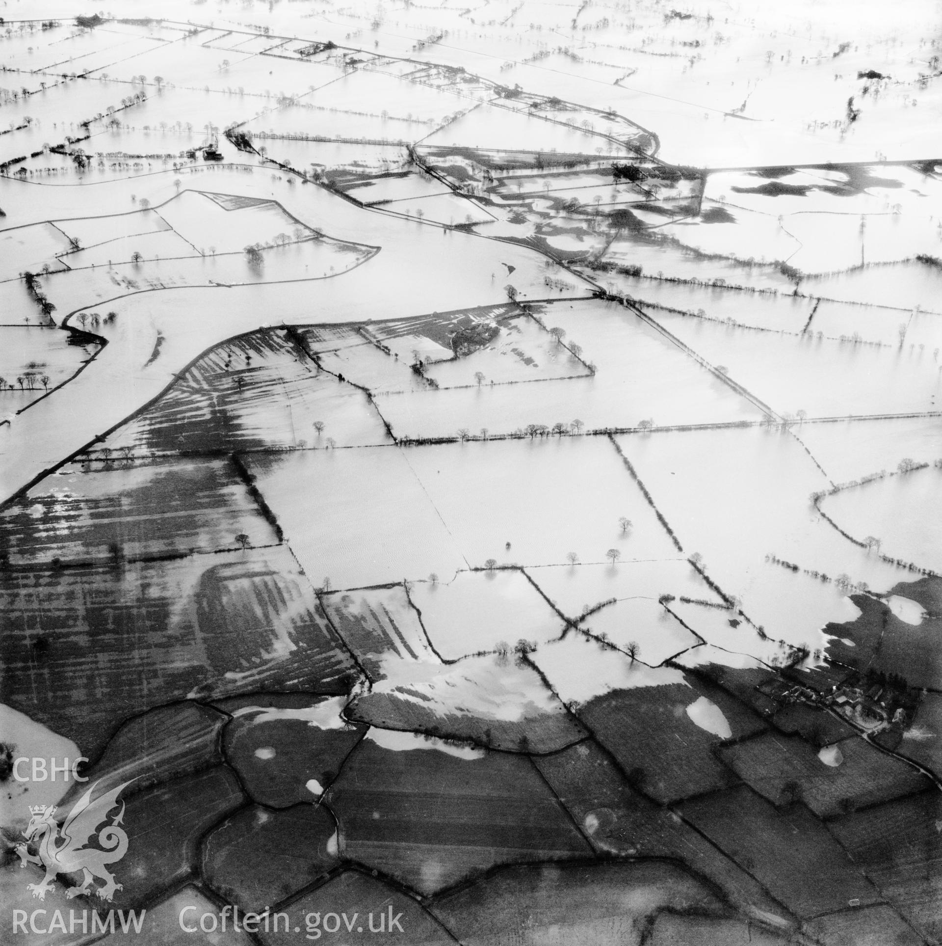 View of the river Severn in flood in the Criggion and Breiddan Hill area. Oblique aerial photograph, 5?" cut roll film.