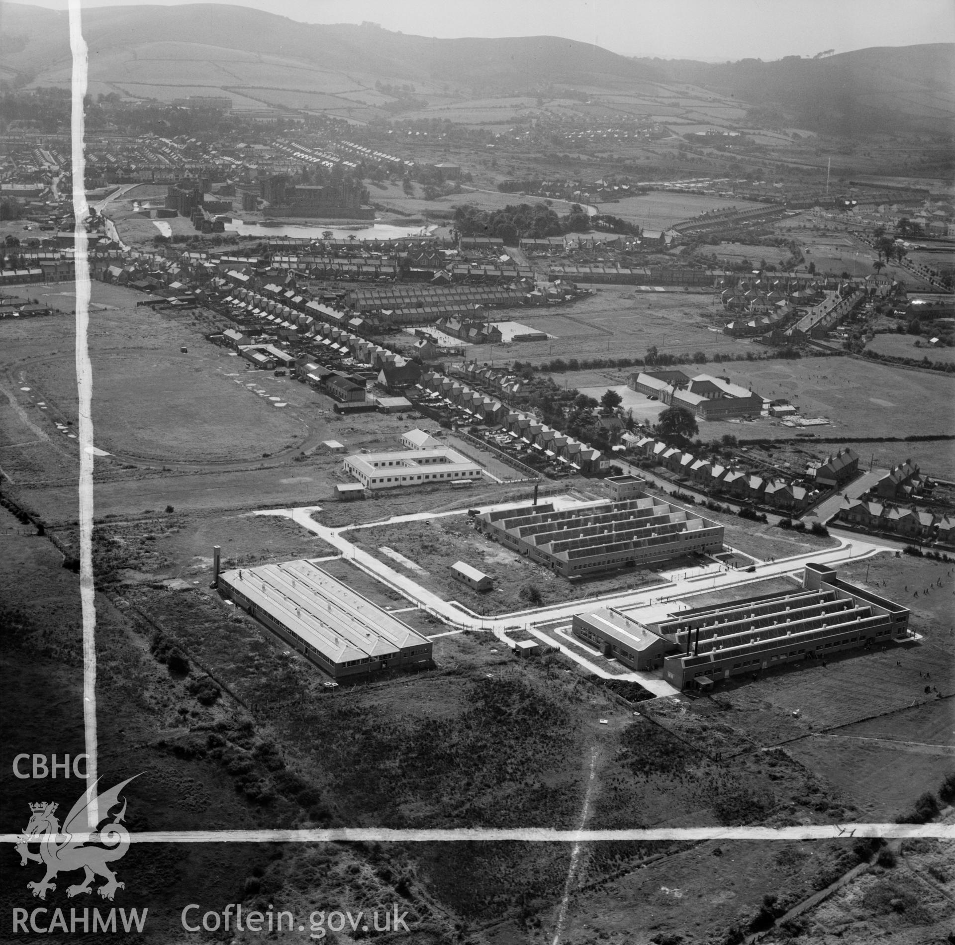 View of three new factories at Virginia Park, Caerphilly, showing the sports ground