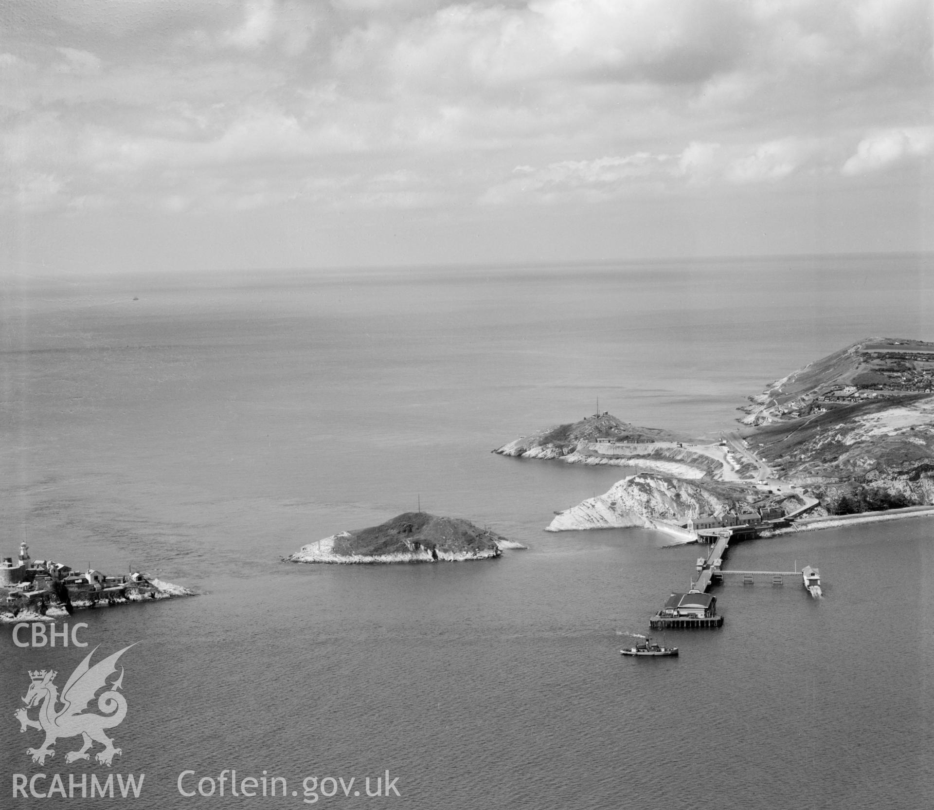 View of Mumbles Head showing pier, lighthouse and fort. Oblique aerial photograph, 5?" cut roll film.
