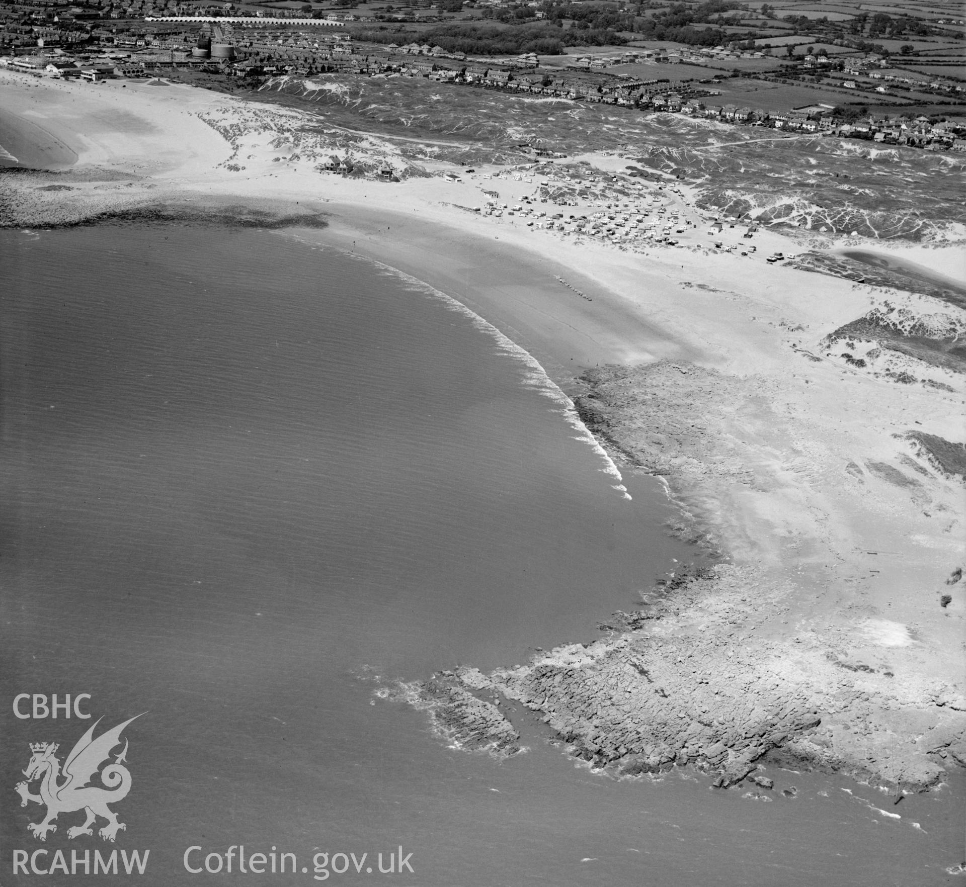 View of Porthcawl showing caravans on beach