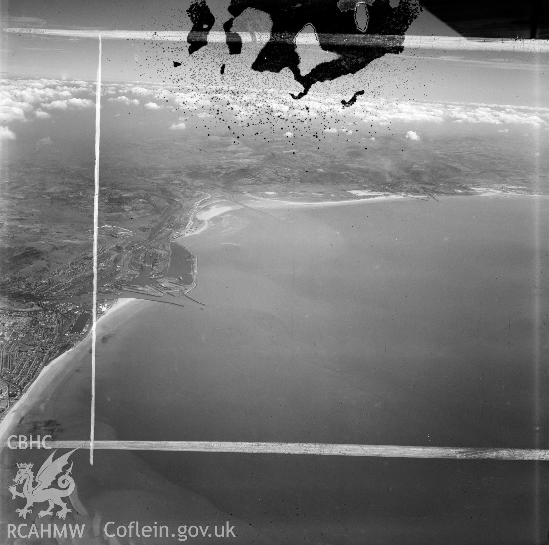 Distant view of  Swansea showing docks