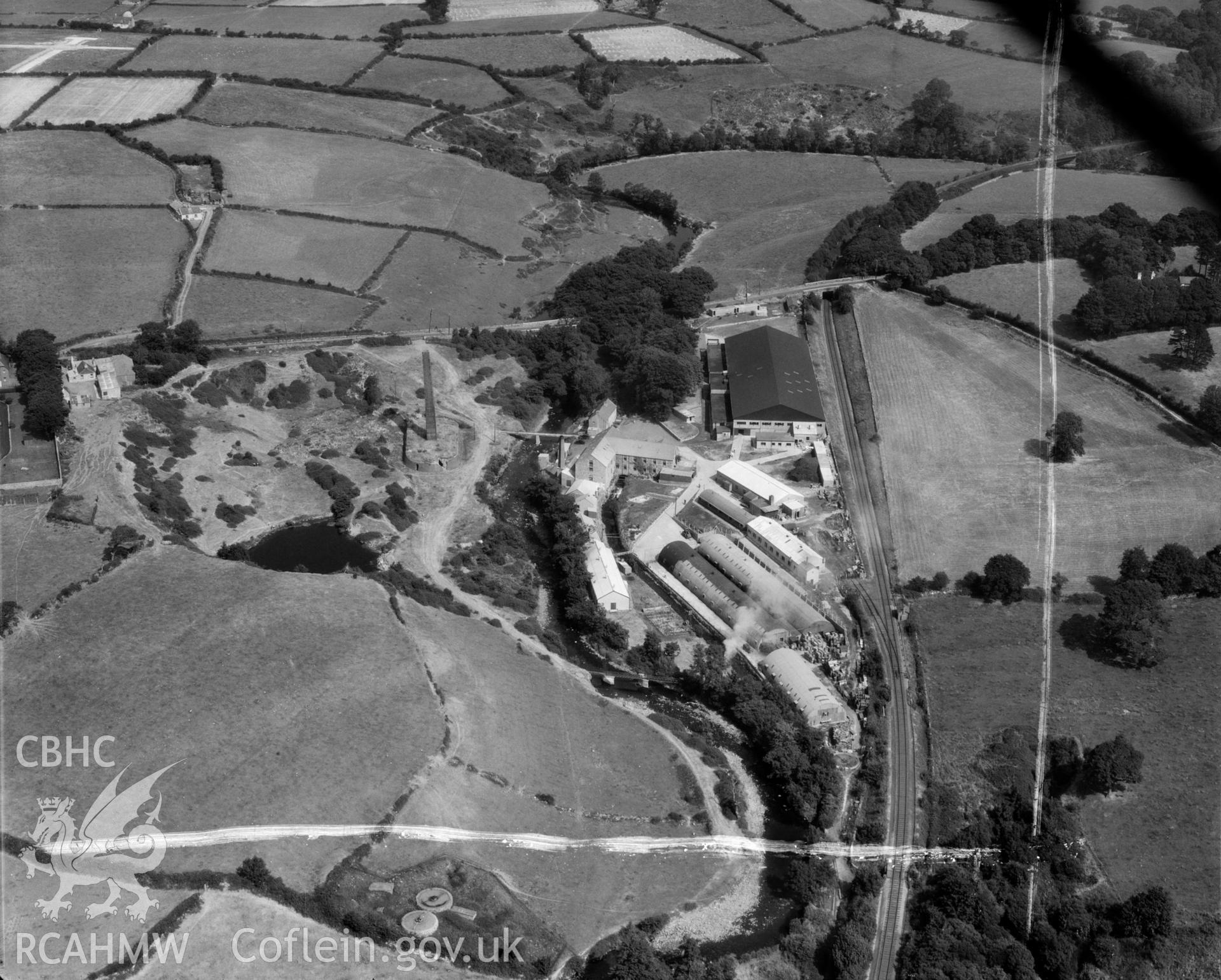 View of factory complex at Peblig Mill, Caernarfon, showing the mill, remains of brickworks, nissan huts and other works buildings
