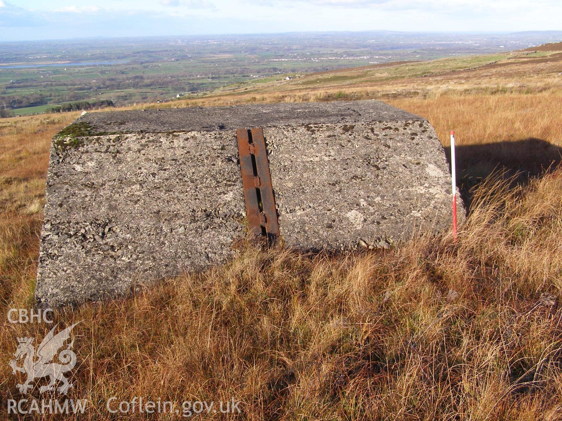 Digital colour photograph of Cefn Du Radio Station, concrete base XXX taken on 12/10/2007 by P.J. Schofield during the Snowdon North West Upland Survey undertaken by Oxford Archaeology North.