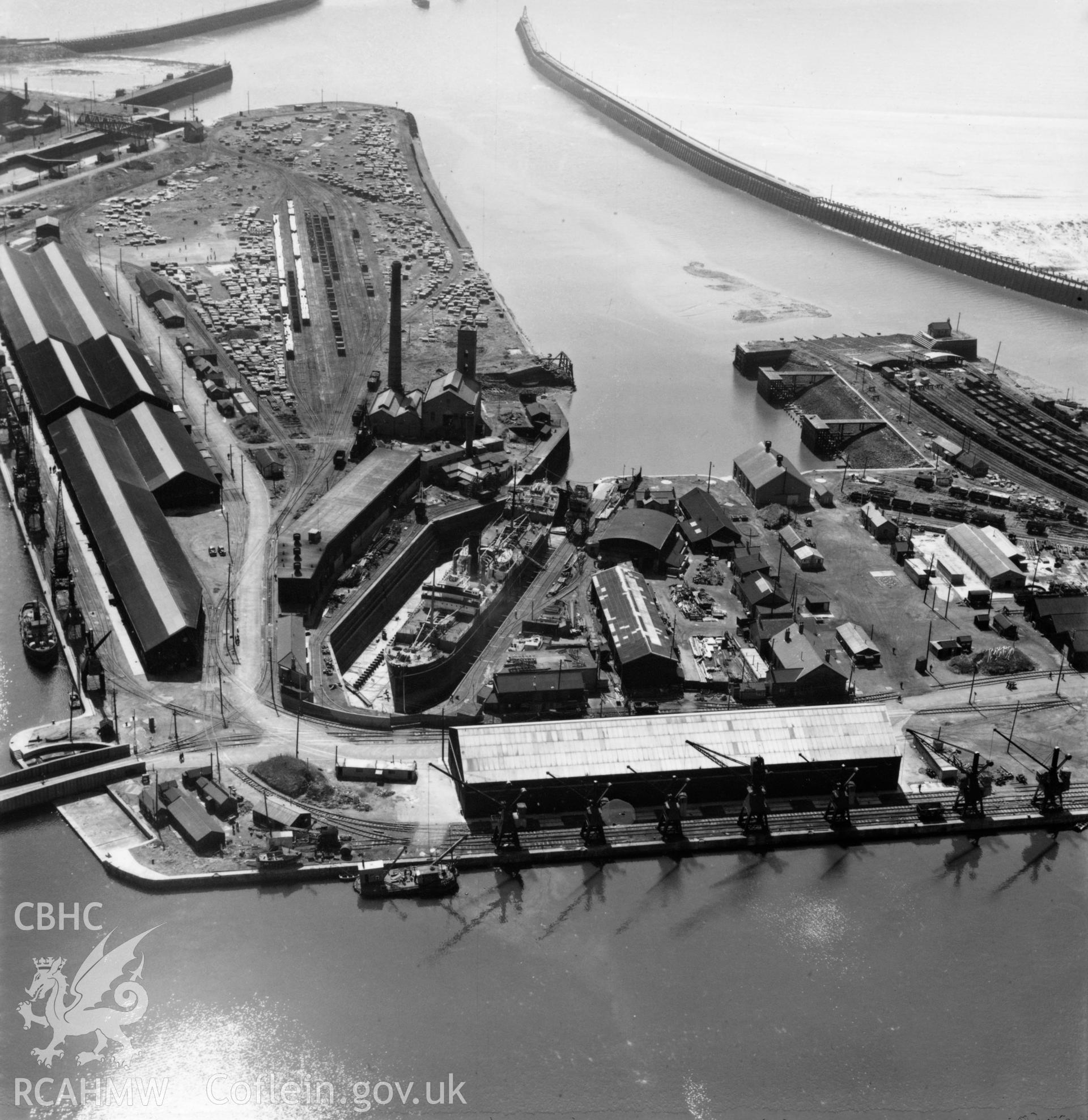 View of Prince of Wales dry dock, Swansea, showing the ship 'Pendeen' in dry dock. Oblique aerial photograph, 5?" cut roll film.