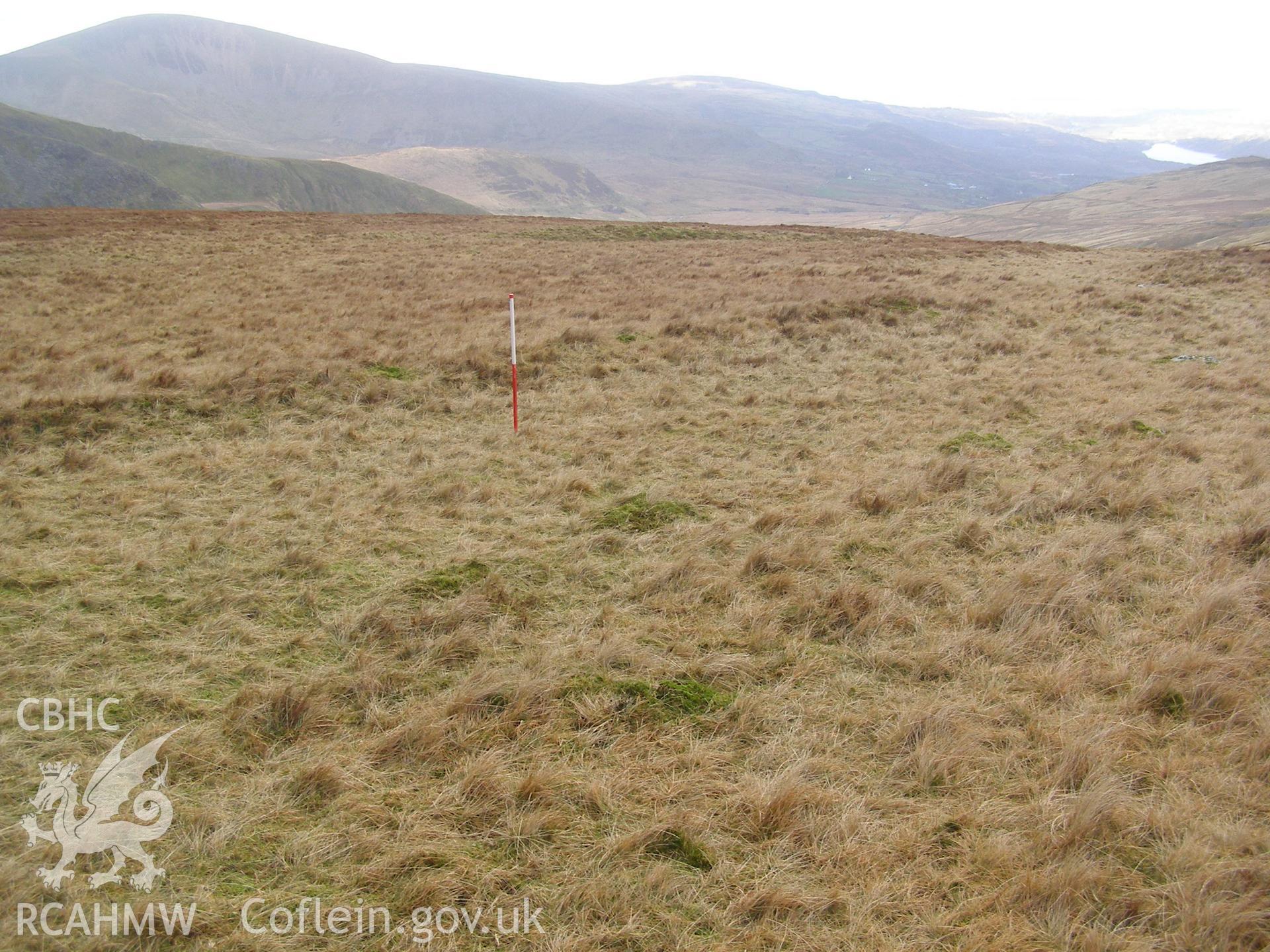 Digital colour photograph of Maen-Du'r Arddu peat cutting taken on 30/01/2008 by P.J. Schofield during the Snowdon North West Upland Survey undertaken by Oxford Archaeology North.