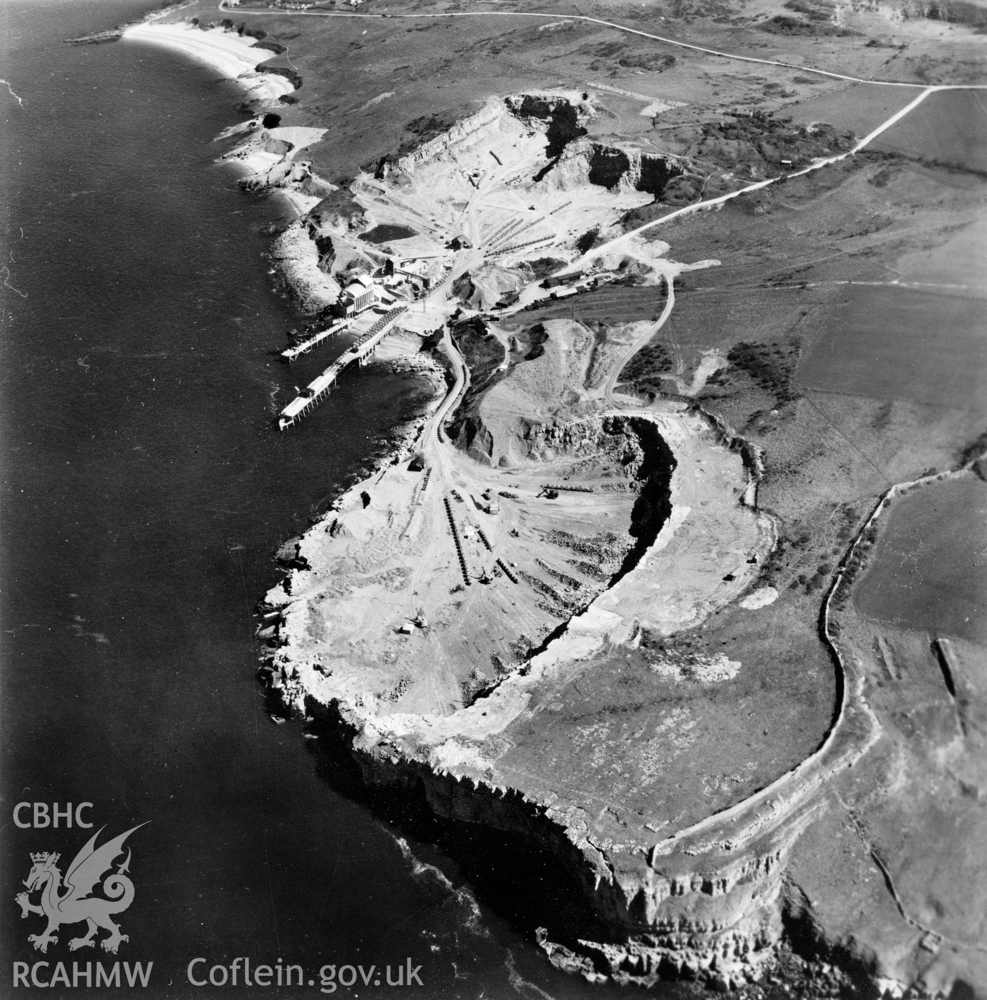 View of Dinmor Park Quarry, Anglesey, commissioned by Cawood Wharton & Co. Ltd.. Oblique aerial photograph, 5?" cut roll film.