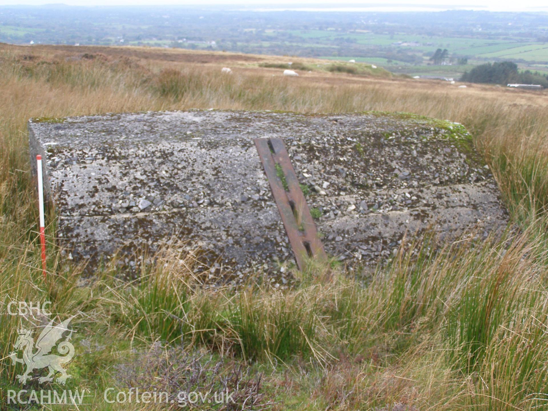 Digital colour photograph of Cefn Du Radio Station, concrete base XXIV taken on 11/10/2007 by P.J. Schofield during the Snowdon North West Upland Survey undertaken by Oxford Archaeology North.