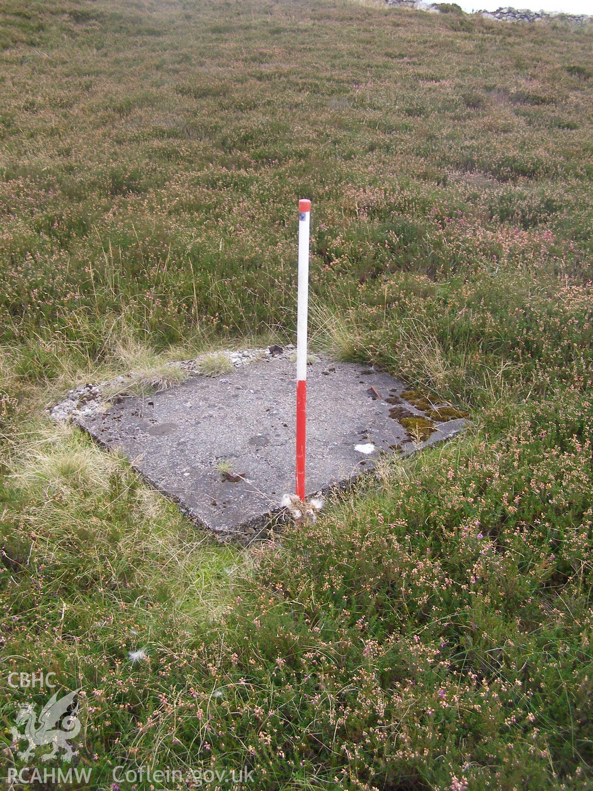Digital colour photograph of Cefn Du Radio Station, concrete base XII taken on 08/10/2007 by P.J. Schofield during the Snowdon North West Upland Survey undertaken by Oxford Archaeology North.