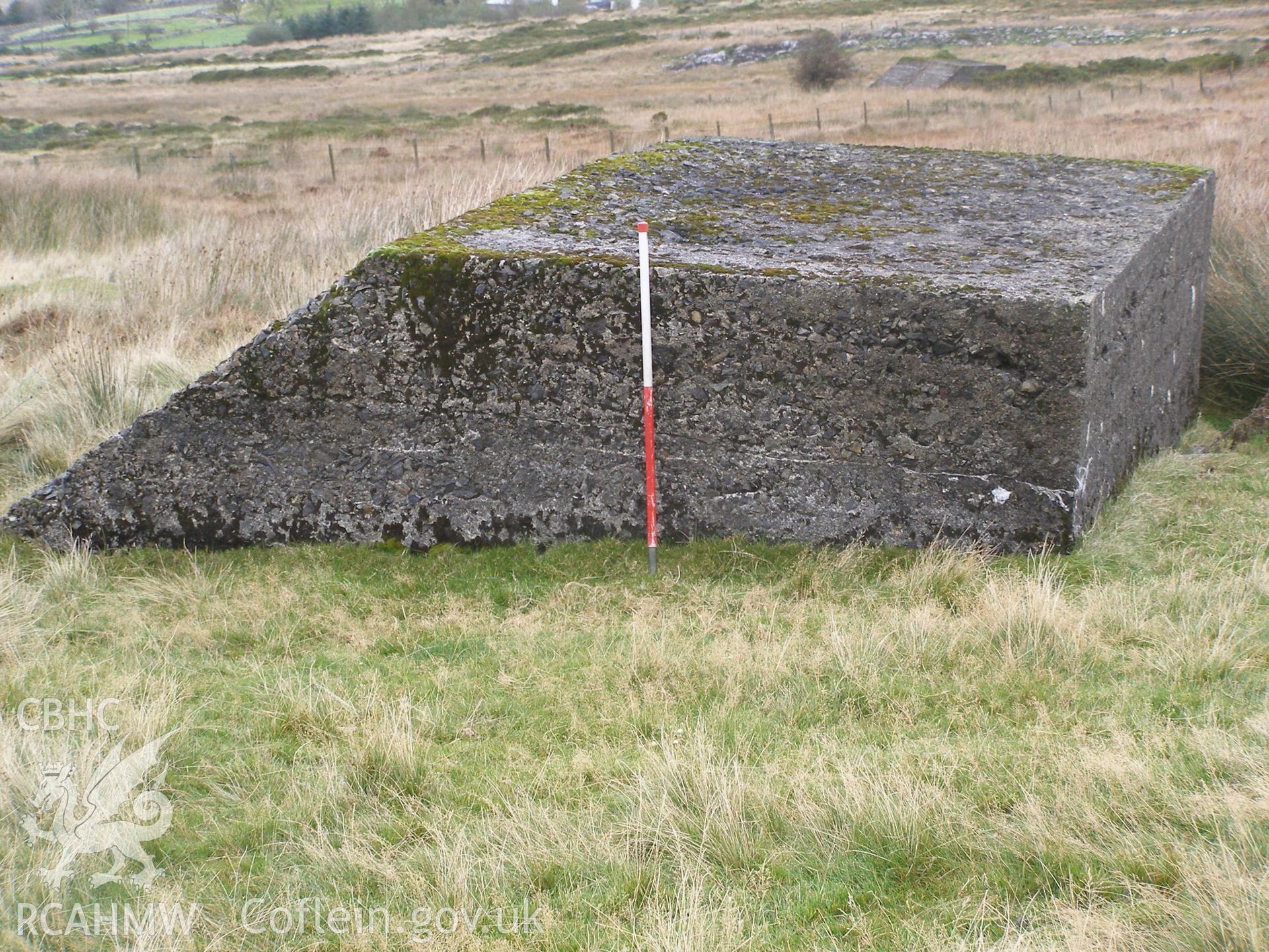 Digital colour photograph of Cefn Du Radio Station, concrete base XV taken on 11/10/2007 by P.J. Schofield during the Snowdon North West Upland Survey undertaken by Oxford Archaeology North.