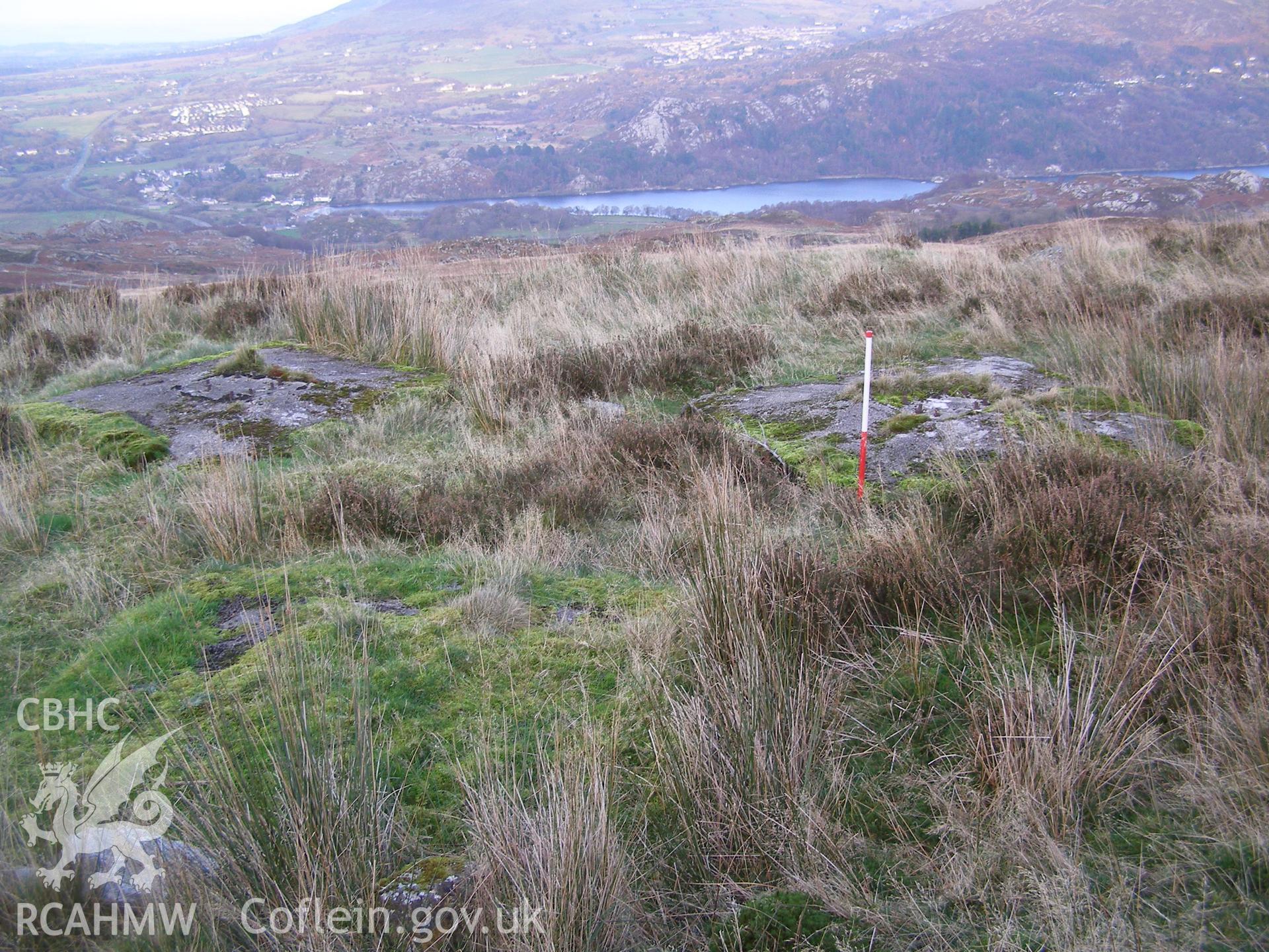 Digital colour photograph of Cefn Du Radio Station, concrete base LXVI taken on 13/12/2007 by P.J. Schofield during the Snowdon North West Upland Survey undertaken by Oxford Archaeology North.