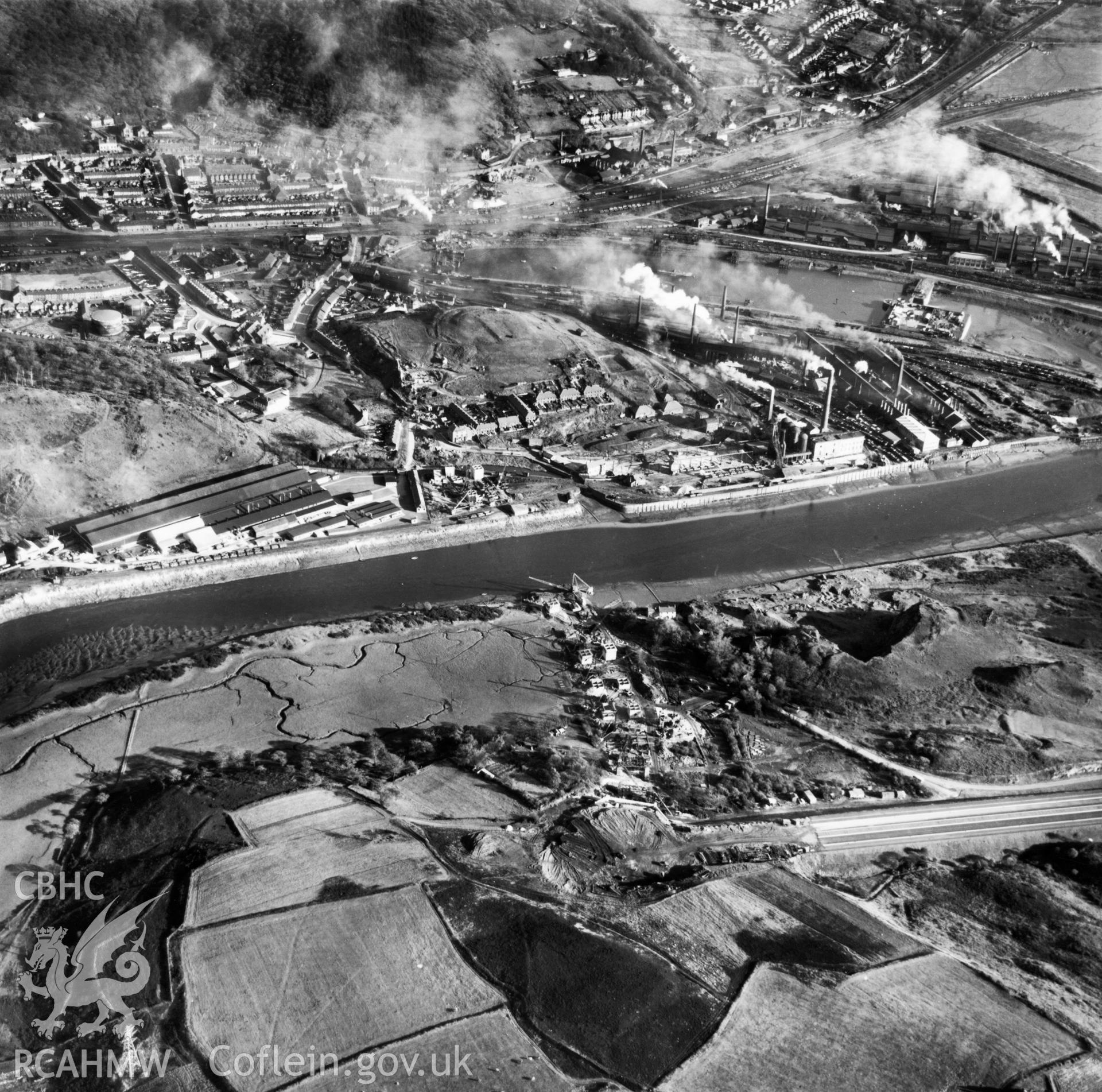 View of the Cleveland Bridge & Engineering Co. Ltd. bridge under construction at Briton Ferry. Oblique aerial photograph, 5?" cut roll film.