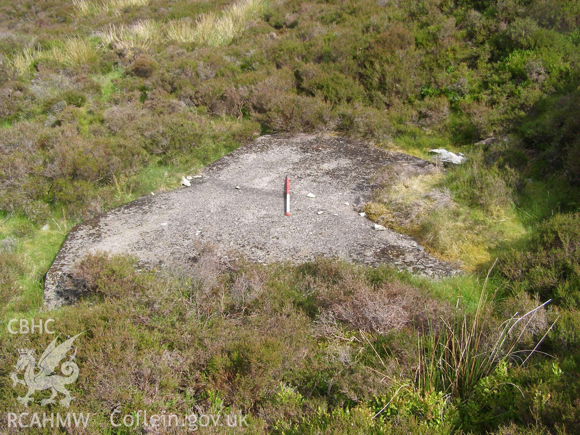 Digital colour photograph of Cefn Du Radio Station, concrete base III taken on 07/06/2007 by P.J. Schofield during the Snowdon North West Upland Survey undertaken by Oxford Archaeology North.